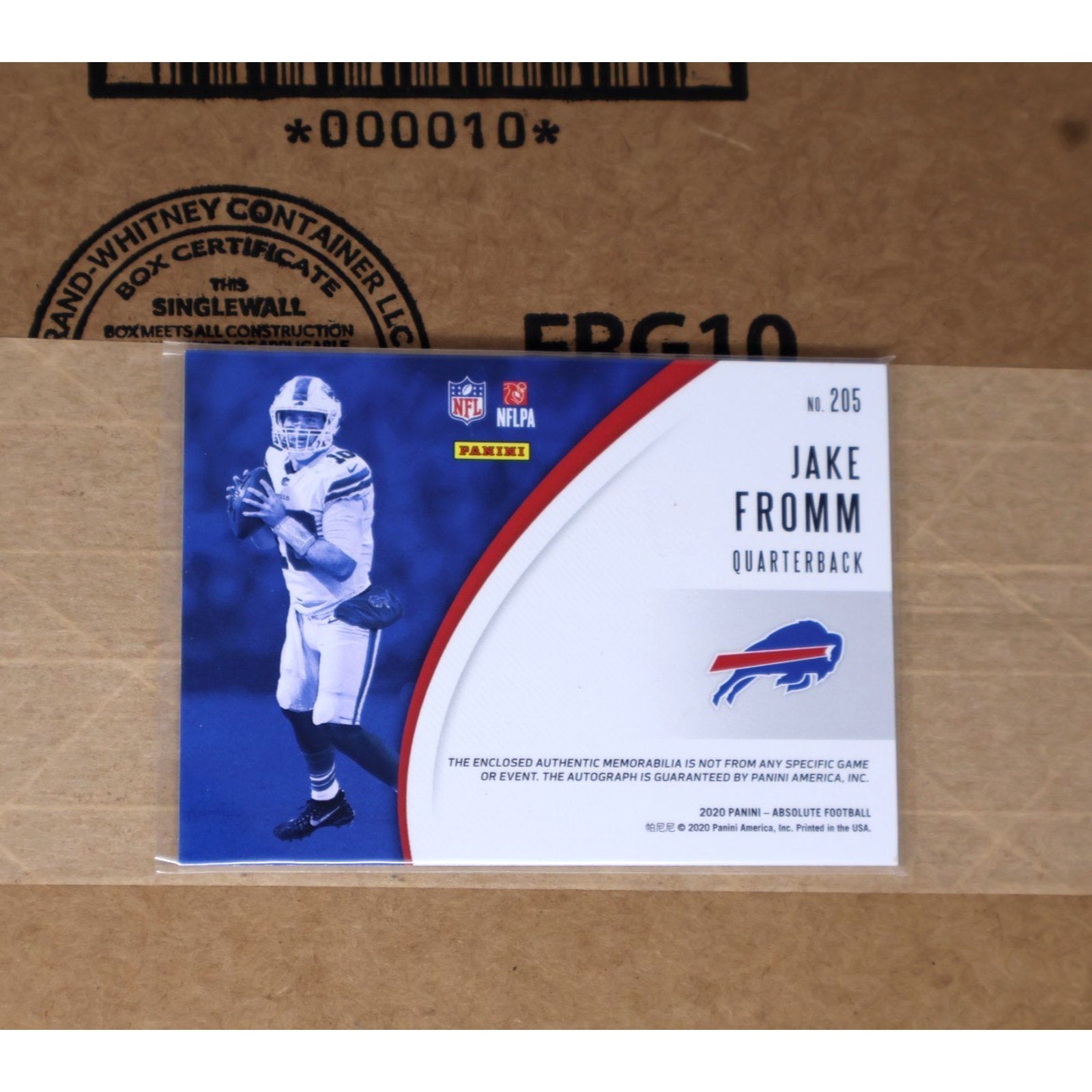 Front angled view of Jake Fromm 2020 Panini Absolute Rookie Premiere auto triple relic football card collectible