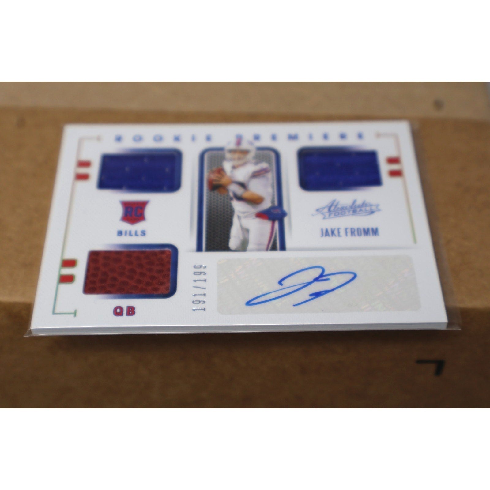 Full front display of Jake Fromm rookie autograph card with triple memorabilia patches from Panini Absolute Football