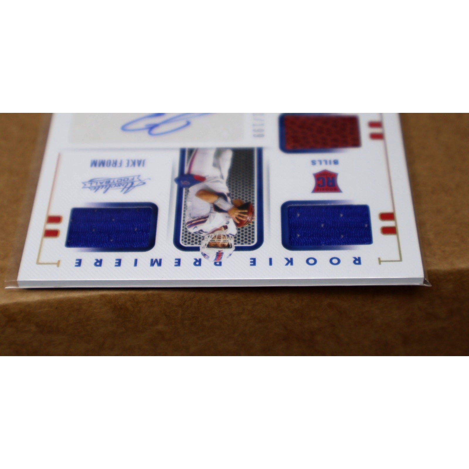 Close-up angled view of Jake Fromm Buffalo Bills rookie patch auto card numbered /199