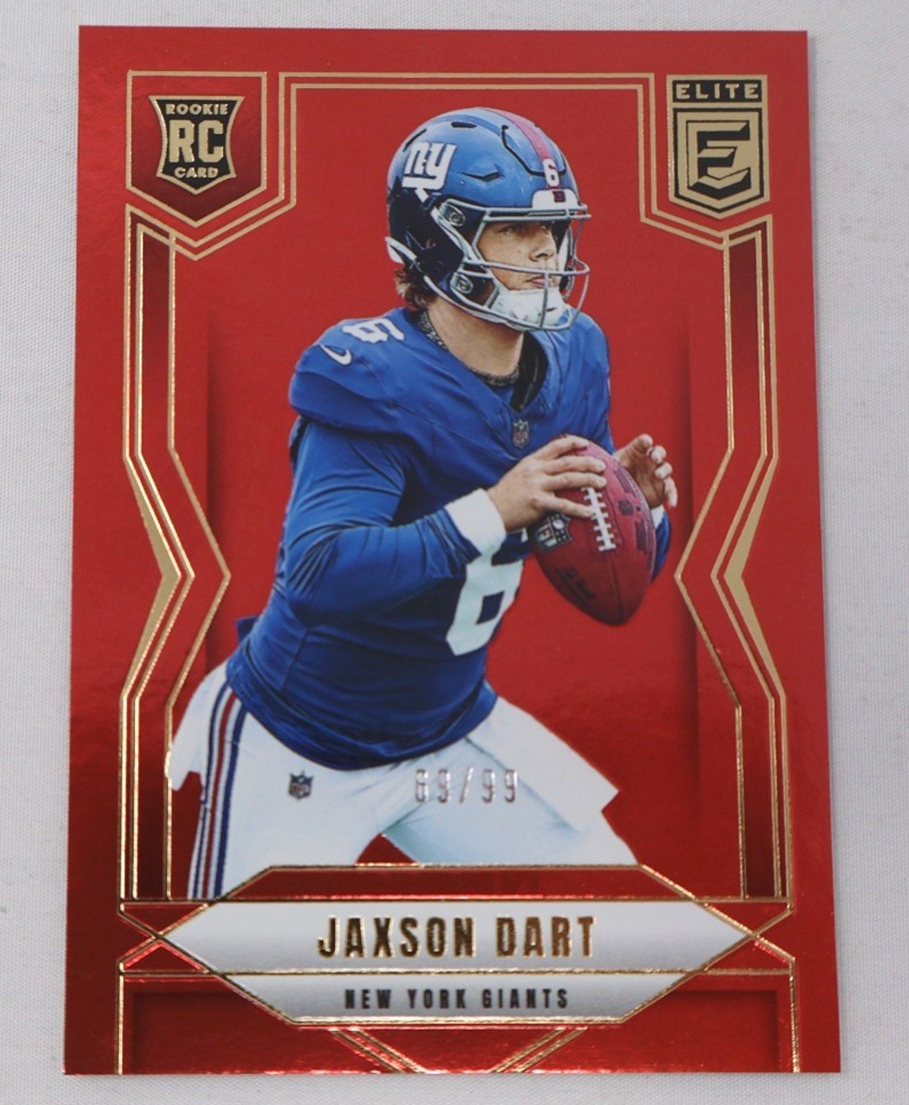 2025 Donruss Elite Jaxson Dart rookie card red parallel numbered to 99 featuring New York Giants quarterback