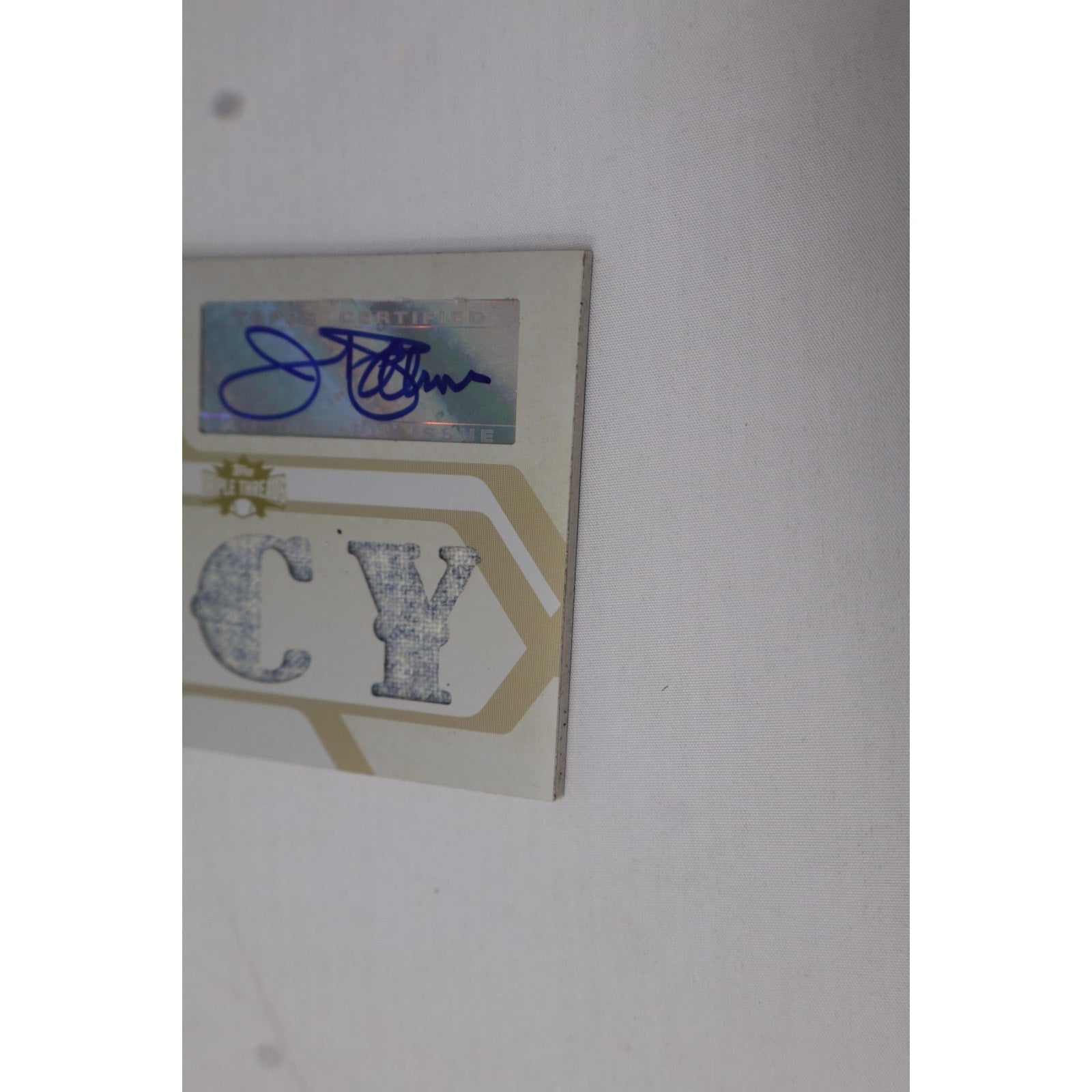 Close-up detail of Jim Palmer autograph and triple patch window on White Whale 1/1 card