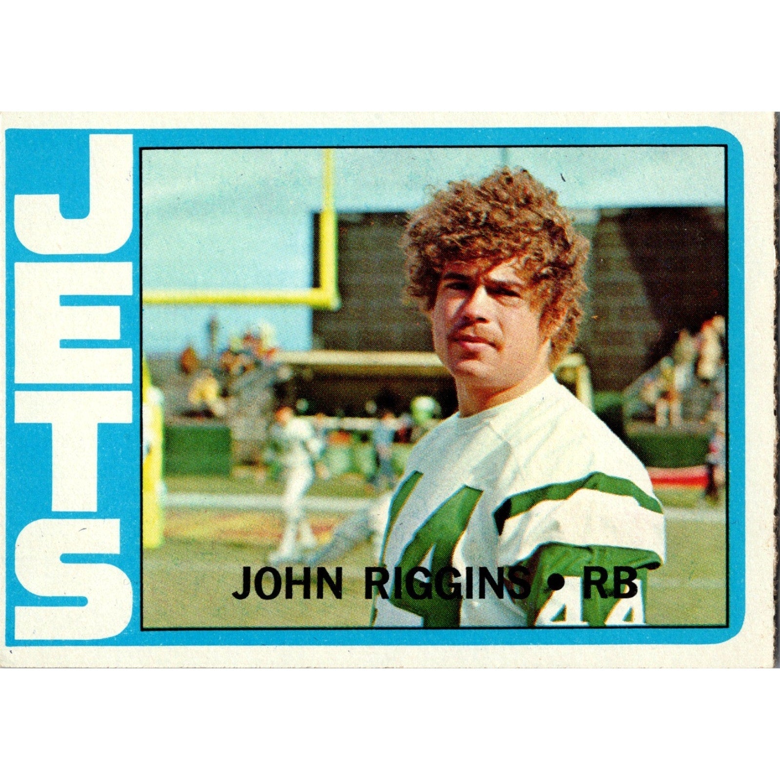 Front close-up of 1972 Topps John Riggins rookie football card with classic New York Jets design