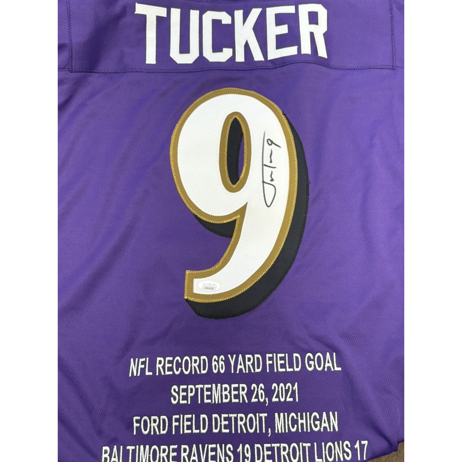 Justin Tucker signed Baltimore Ravens purple stitched jersey with Lions kick inscription front view