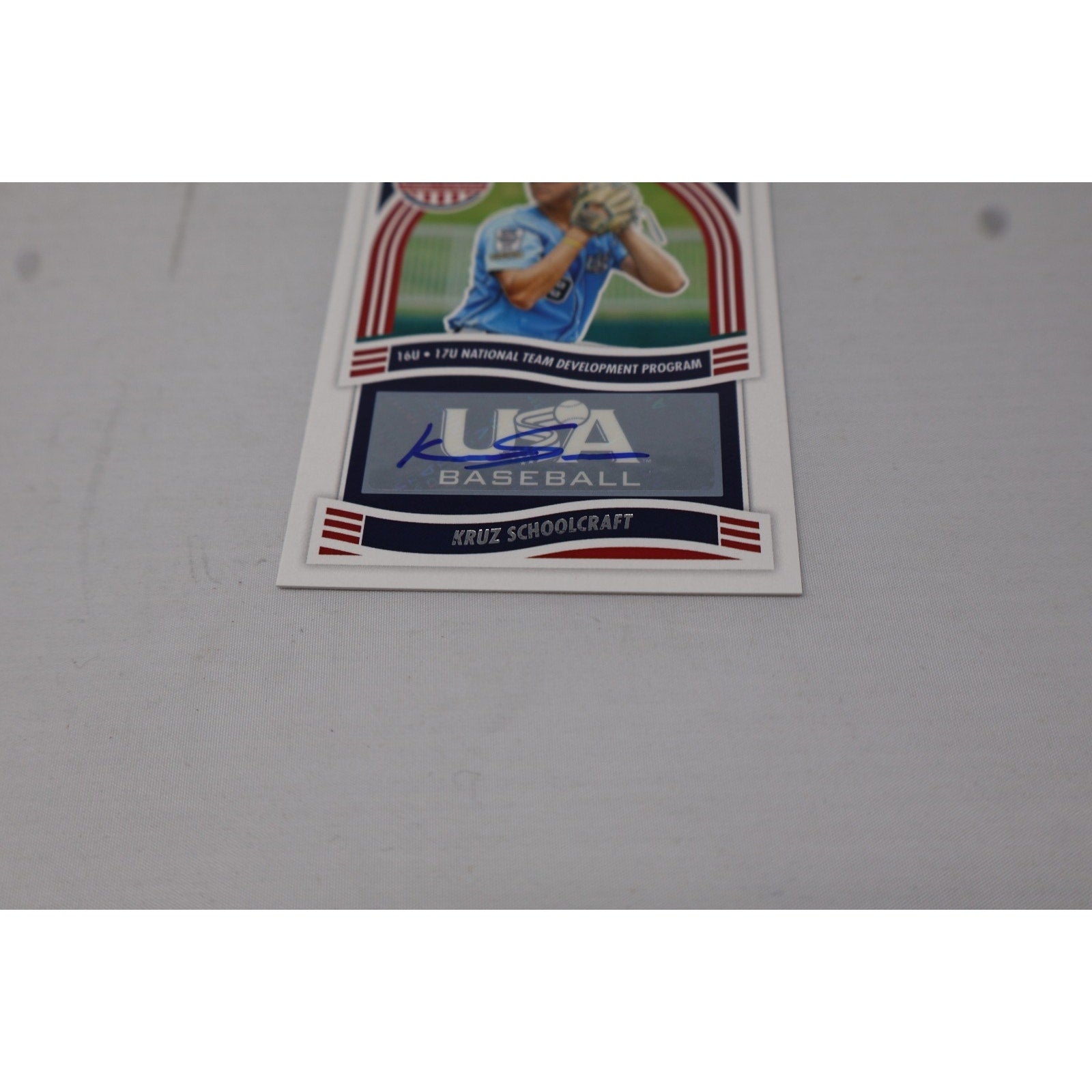 Close-up view of certified autograph section on Kruz Schoolcraft rookie card