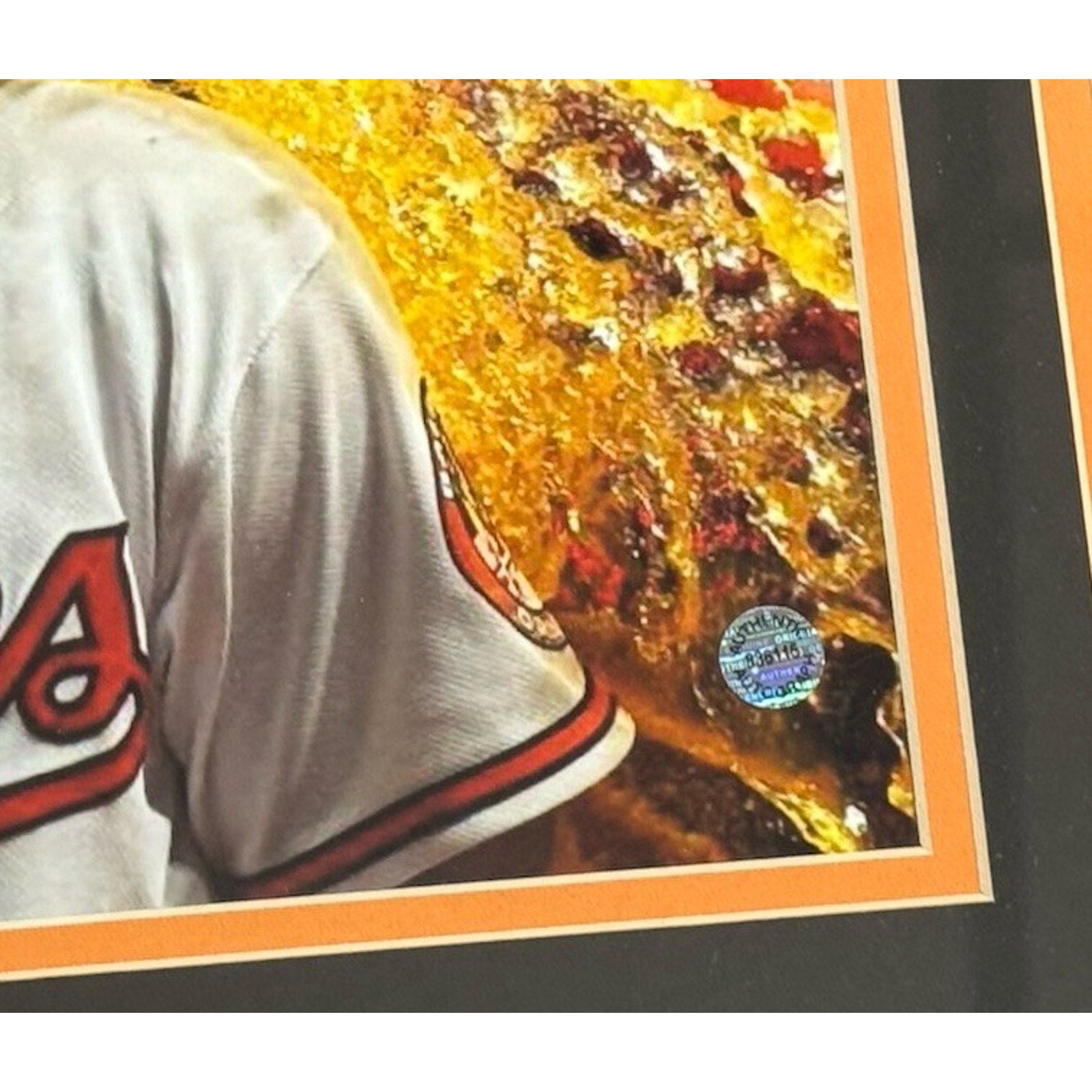 Detail of Kyle Bradish autograph on Orioles framed display