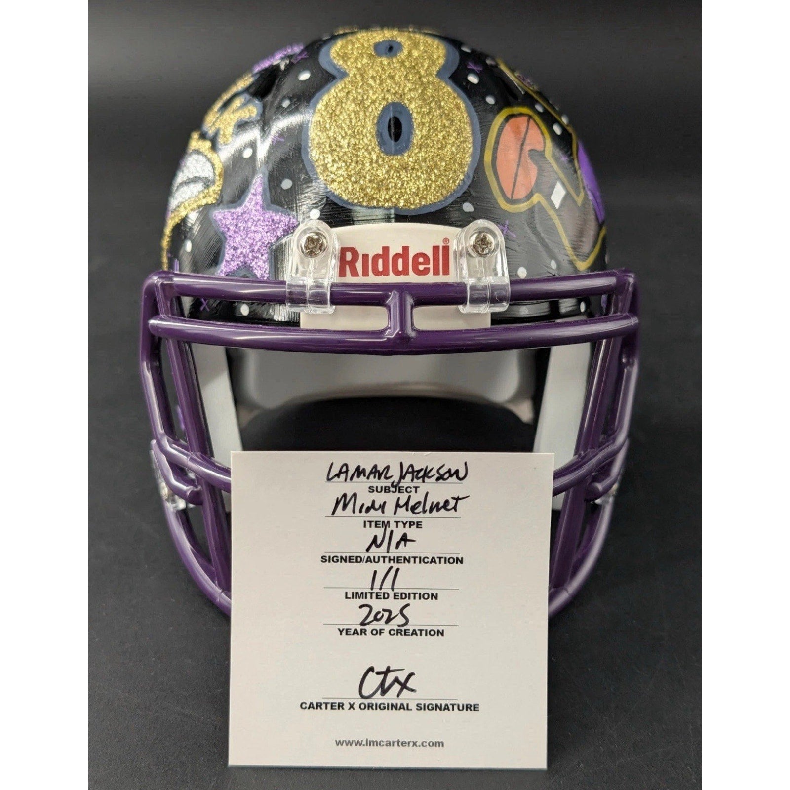 Lamar Jackson Carter X 1/1 hand-painted Baltimore Ravens mini helmet front view with custom artwork