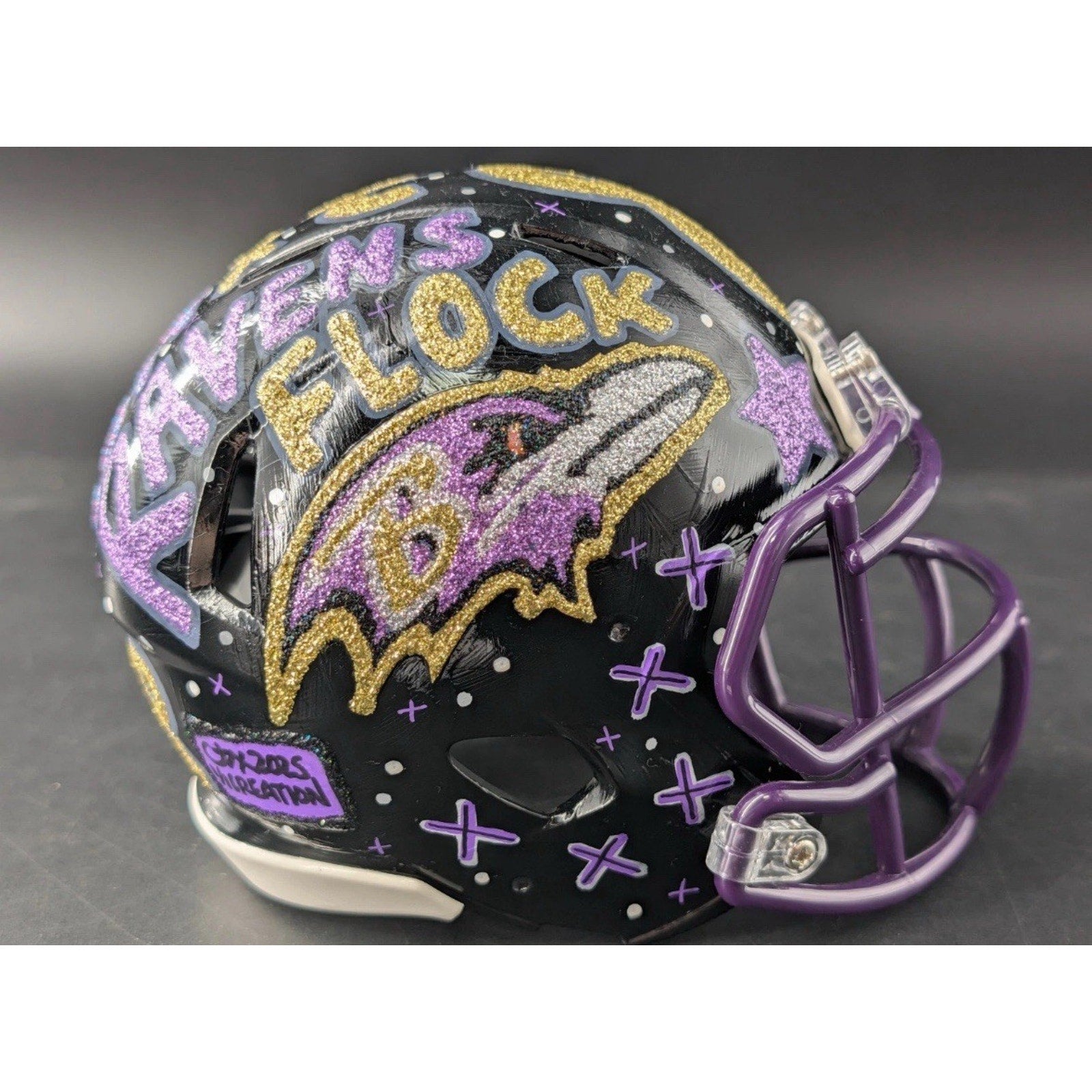Opposite side view of Baltimore Ravens Lamar Jackson custom painted mini helmet with detailed artwork