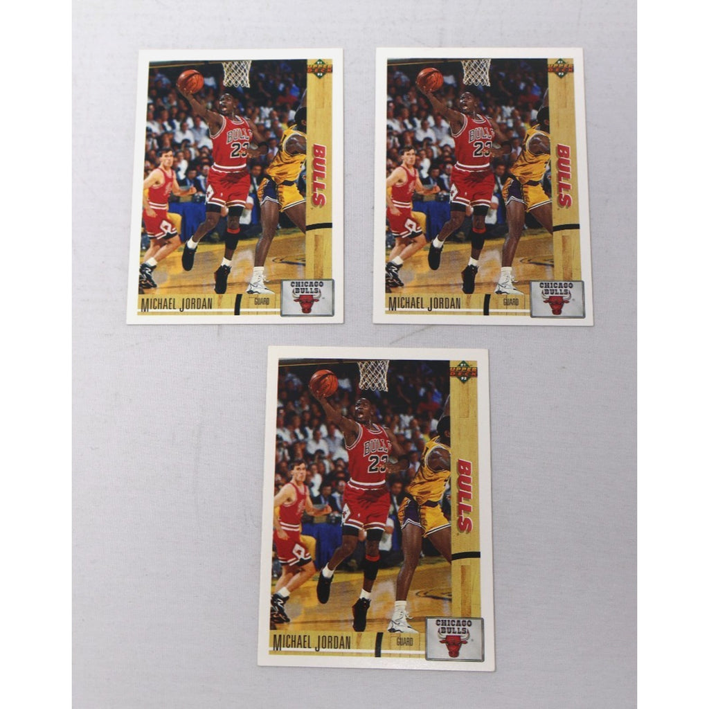 Front view of three 1991 Upper Deck Michael Jordan #44 “The Shadow” Chicago Bulls basketball trading cards displayed together