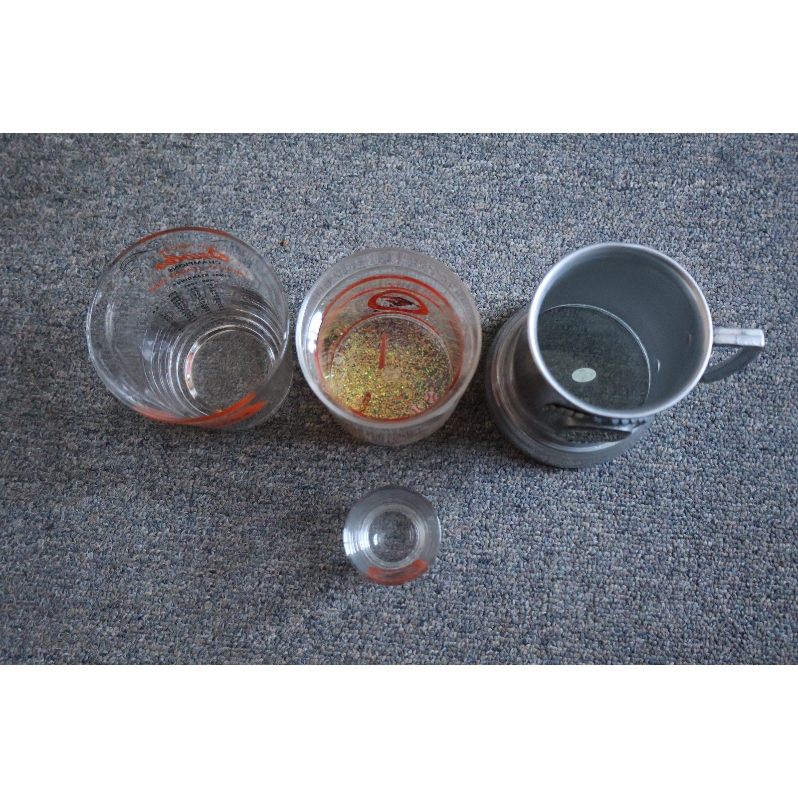 Top view of Baltimore Orioles vintage cups and 1966 AL Champions mug collectible lot