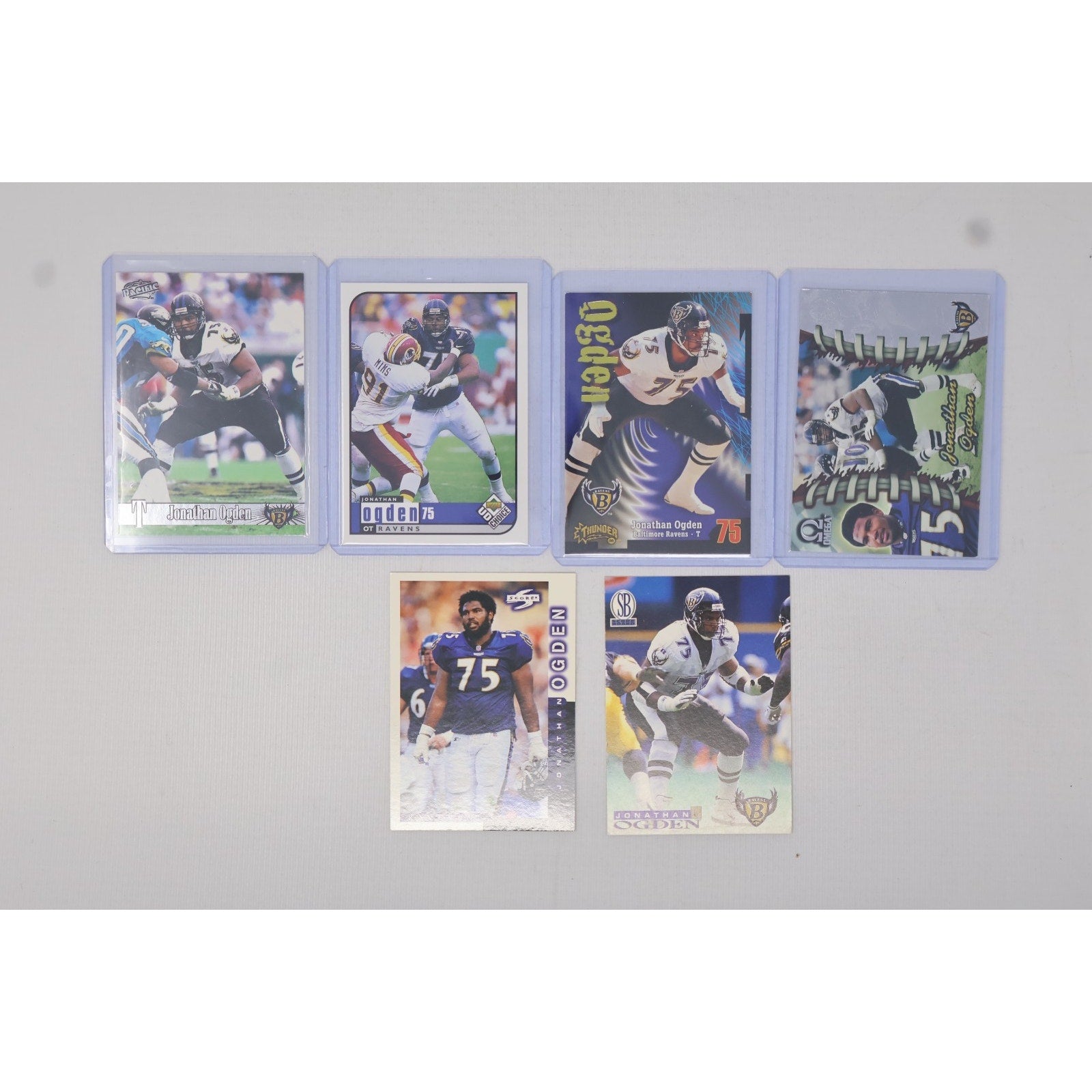 Lot of 6 Jonathan Ogden Baltimore Ravens insert football trading cards featuring multiple Ravens-era NFL card designs in Near Mint condition