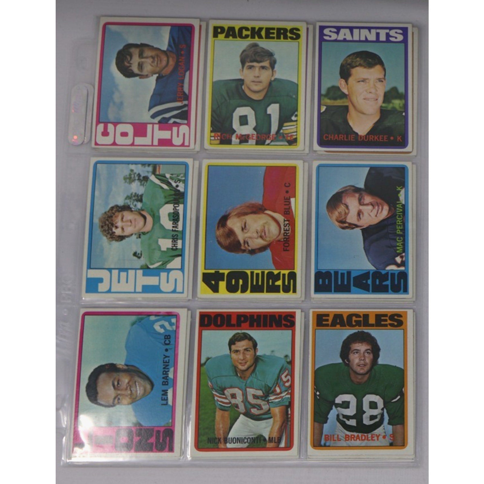 Lot of 9 vintage 1972 Topps football cards featuring NFL stars and Hall of Fame players including Nick Buoniconti, Dan Abramowicz, and players from the Packers, Saints, Dolphins, Eagles, and Jets