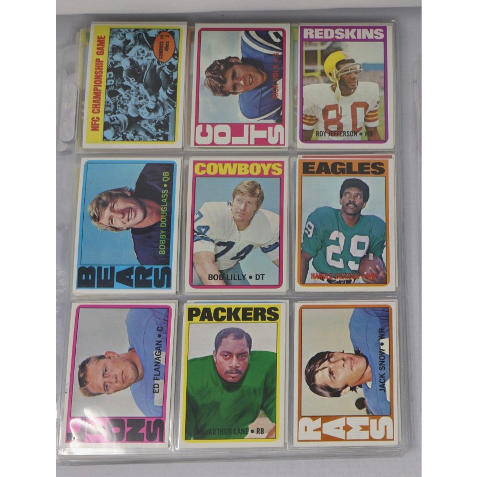 Lot of 9 vintage 1972 Topps football cards featuring NFL stars and Hall of Fame players including Bob Lilly, Otis Taylor, Timmy Brown, and players from the Cowboys, Redskins, Eagles, Packers, and Dolphins