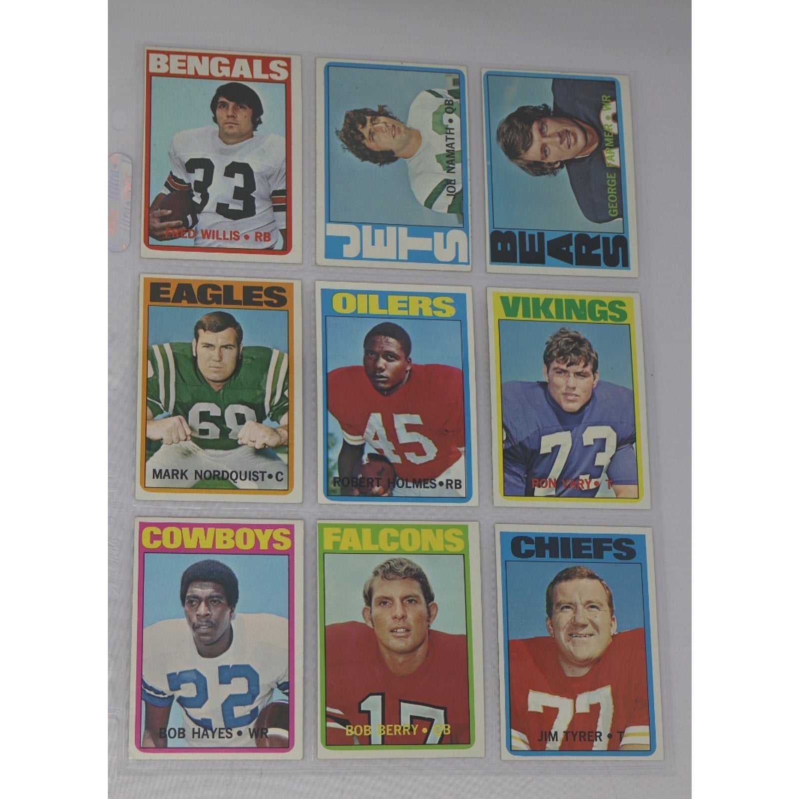 Lot of 9 vintage 1972 Topps football cards featuring NFL stars and Hall of Fame players including Joe Namath, Ron Yary, and Lemar Parrish-era players from the Bengals, Vikings, Cowboys, Falcons, Chiefs, Eagles, and Oilers