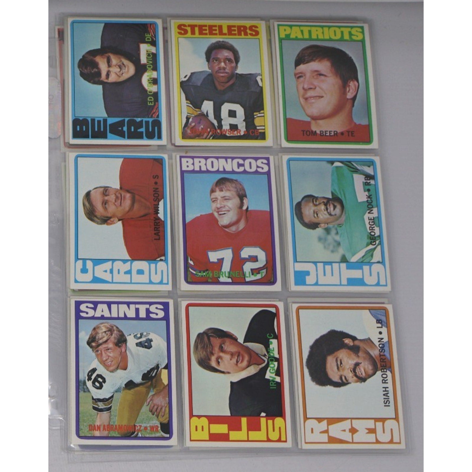 Lot of 9 vintage 1972 Topps football cards featuring NFL stars and Hall of Fame players from teams including the Steelers, Patriots, Broncos, Saints, Dolphins, and Bears