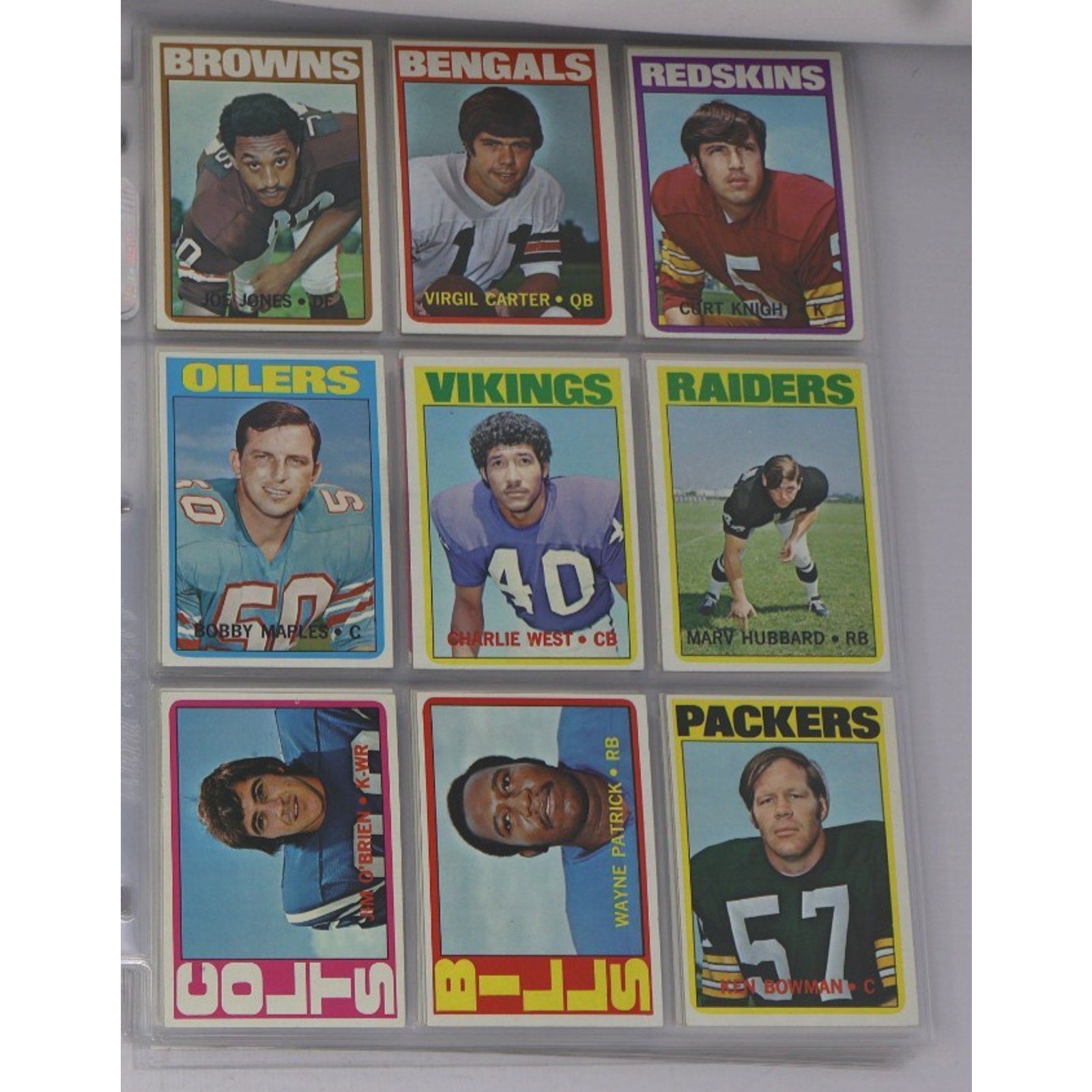 Lot of 9 vintage 1972 Topps football cards featuring NFL stars and Hall of Fame players including O’Brien, Carter, and players from the Browns, Bengals, Vikings, Raiders, and Packers