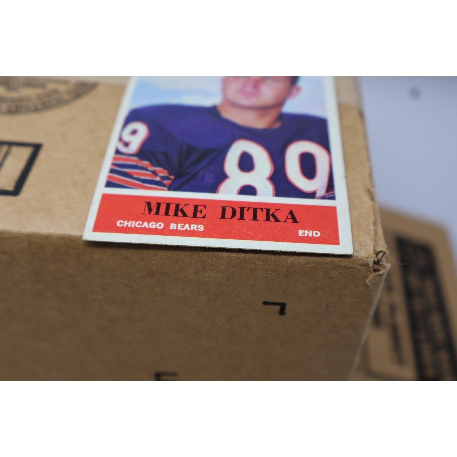 Lower front close-up of 1964 Philadelphia Mike Ditka card borders and details