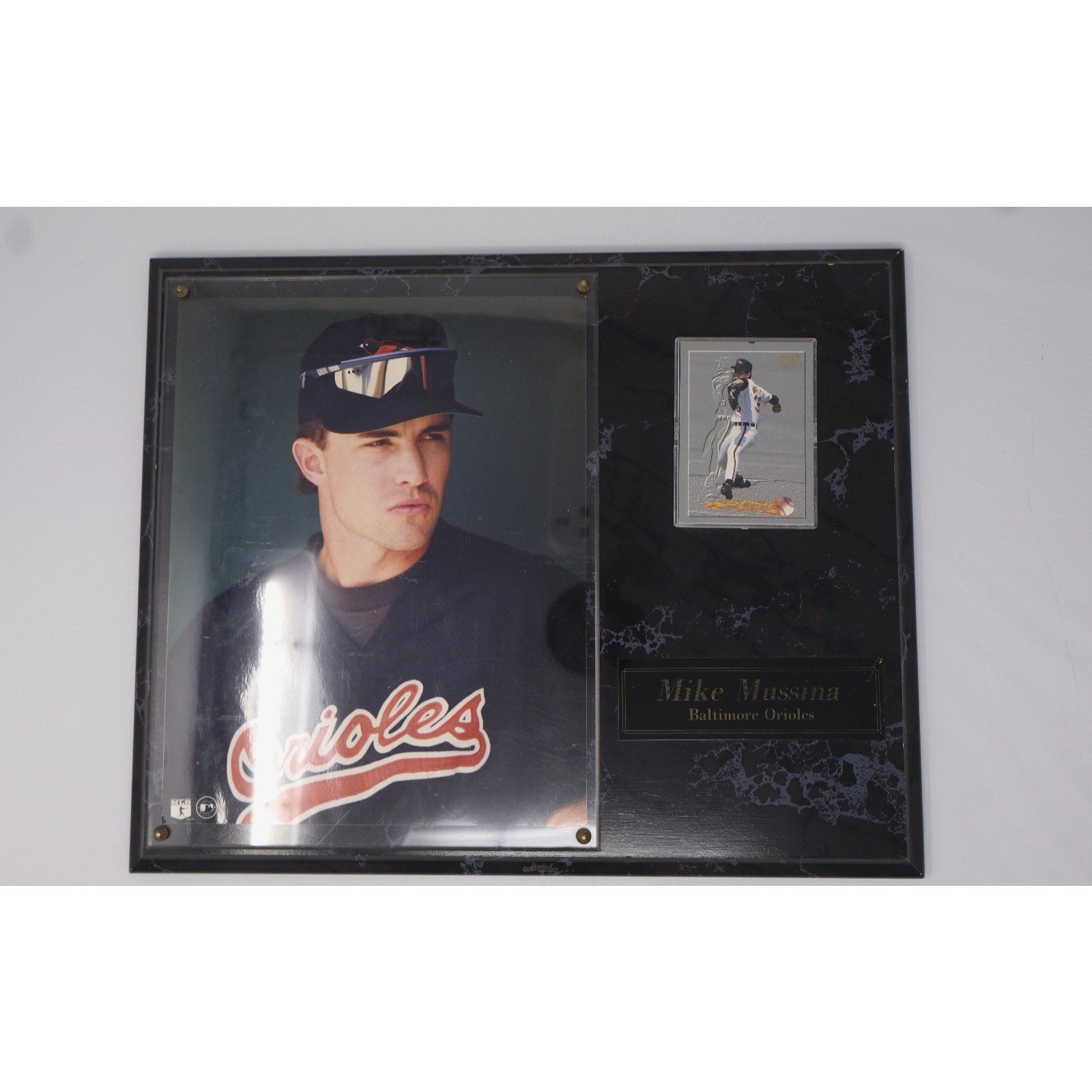 Mike Mussina Baltimore Orioles wooden plaque featuring player photo and embedded baseball card display