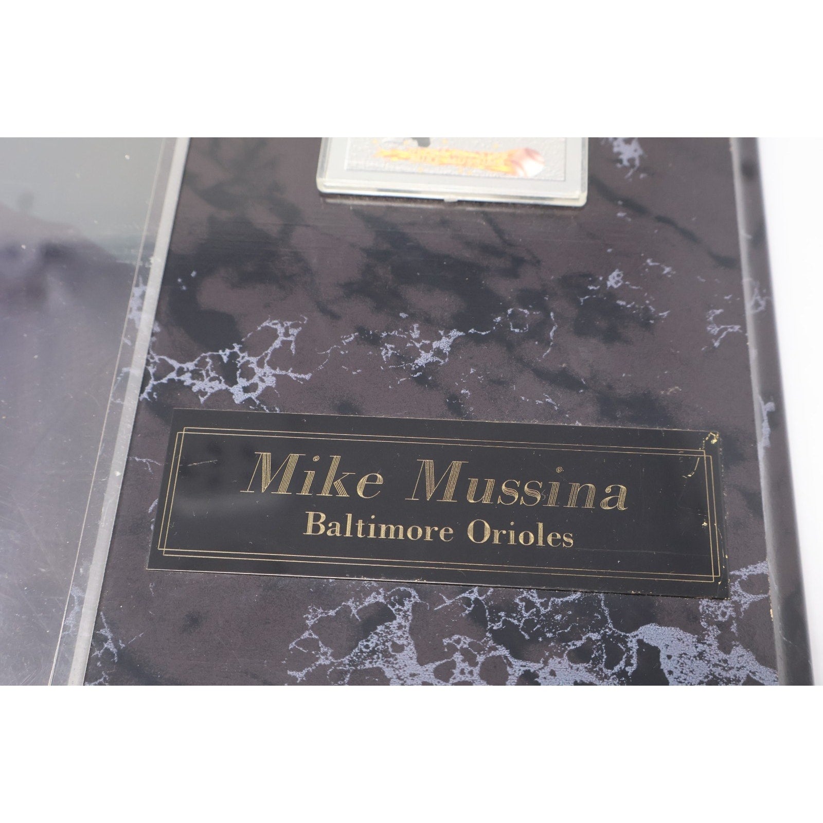 Close-up of Mike Mussina nameplate and Baltimore Orioles themed plaque design