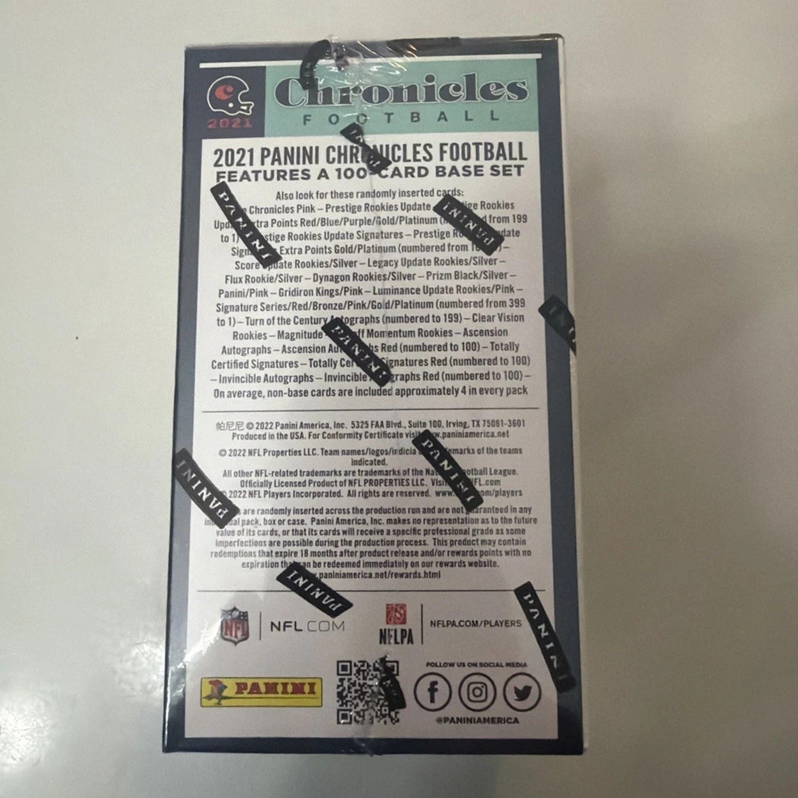 Back view of the sealed 2021 Panini Chronicles Football Blaster Box showing product details, odds information, and Panini branding
