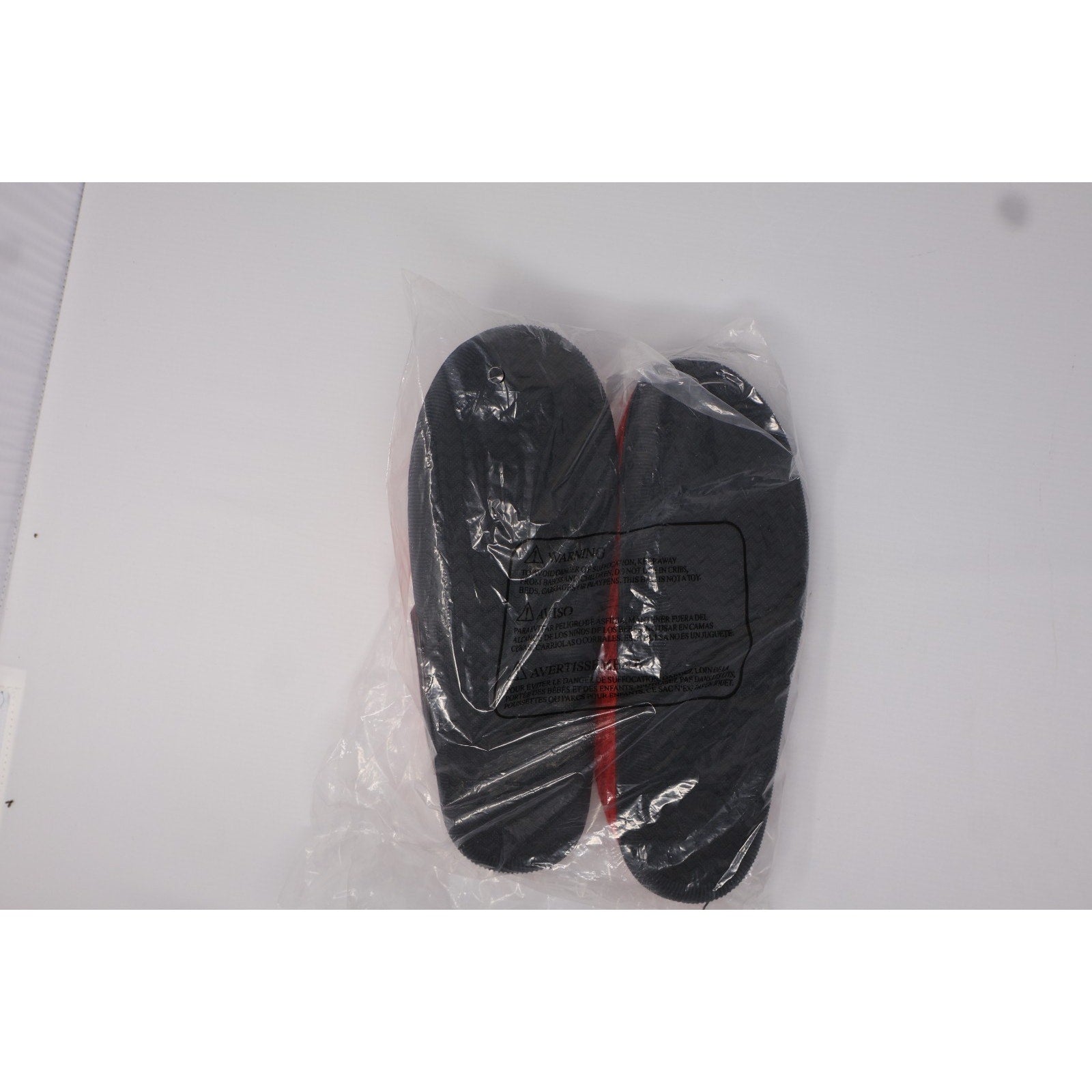 Top-down view of Washington Capitals unisex slippers showing full pair design