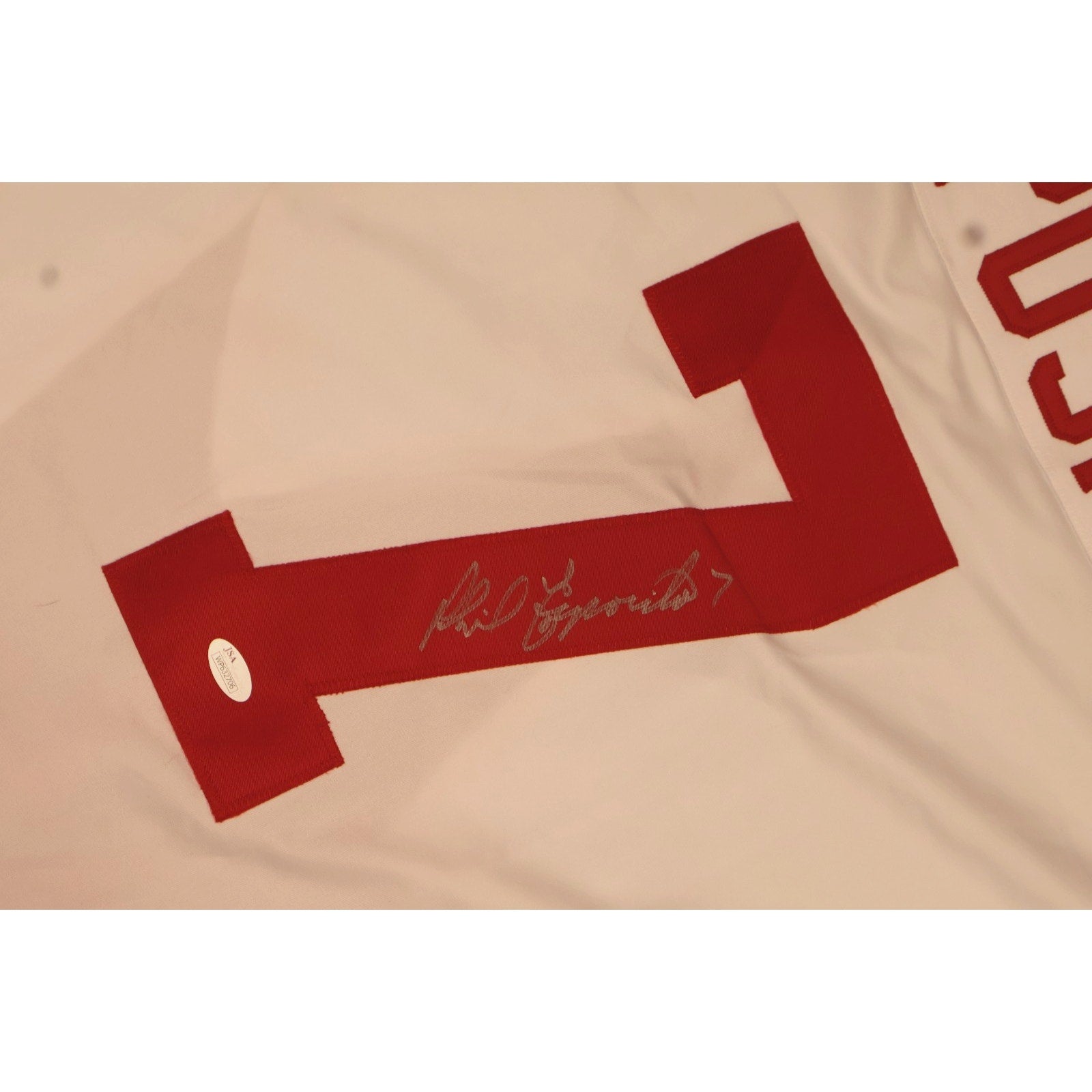 Close-up of Phil Esposito signature on Team Canada hockey jersey sleeve