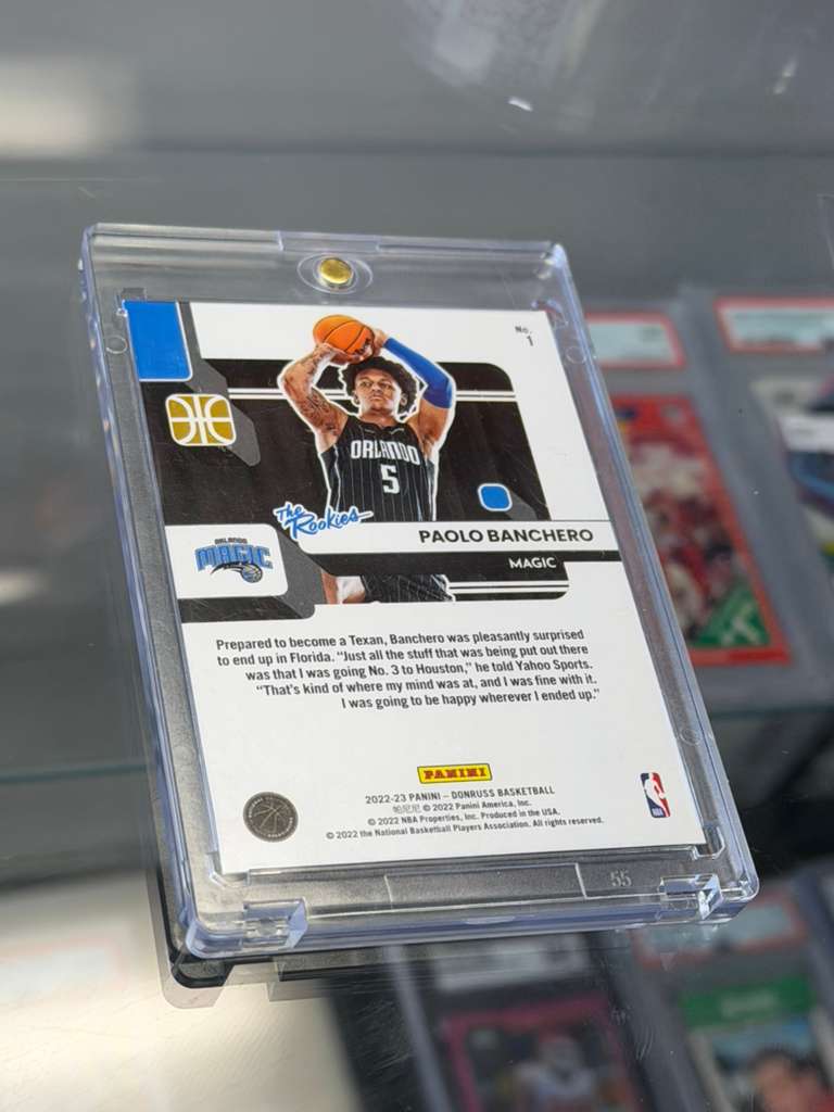 2022-23 Donruss The Rookies Paolo Banchero Purple Laser Parallel card back featuring player information and serial-numbered insert details