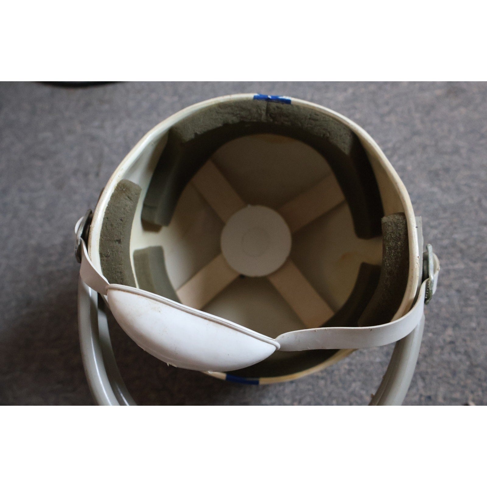 Interior padding and suspension detail inside vintage Rawlings Colts youth helmet