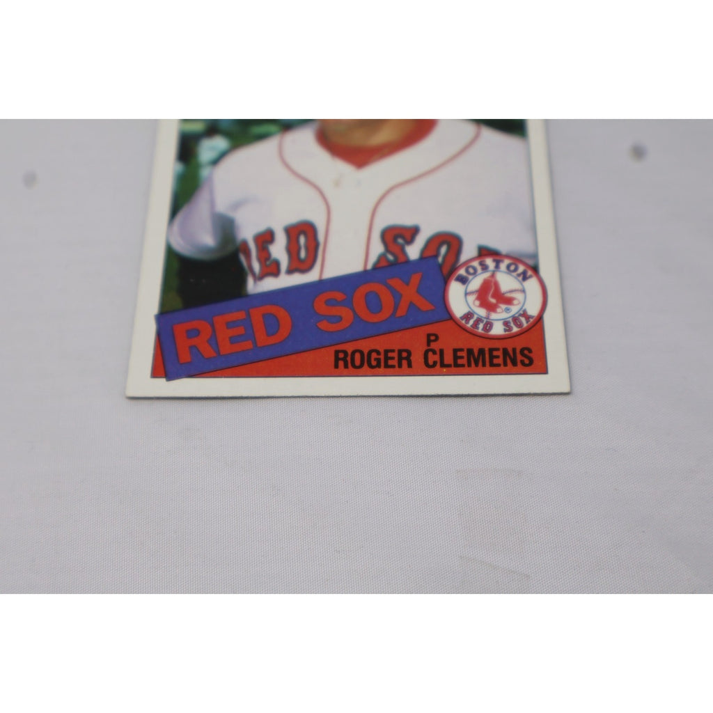 Angled front view of Roger Clemens 1985 Topps rookie card featuring Boston Red Sox team logo