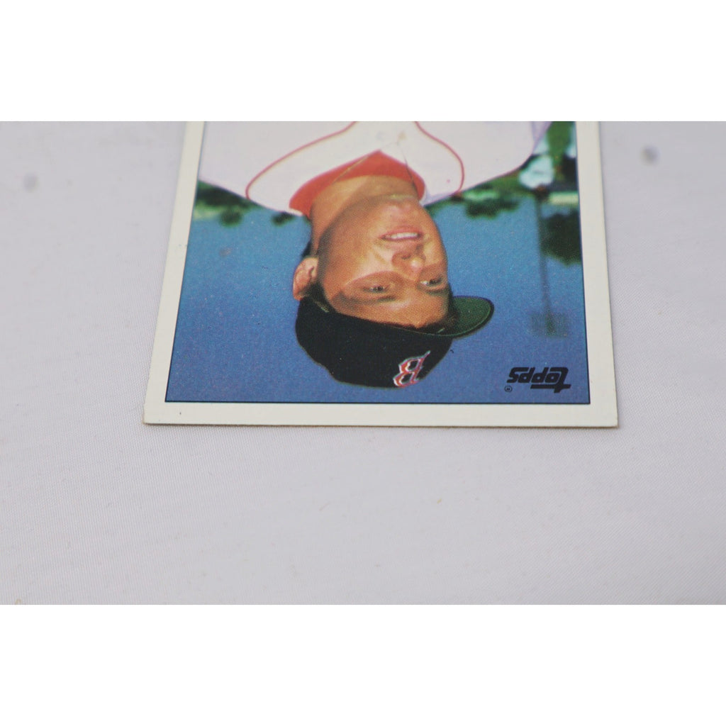 Close-up upside-down image of 1985 Topps Roger Clemens rookie card front design and condition details