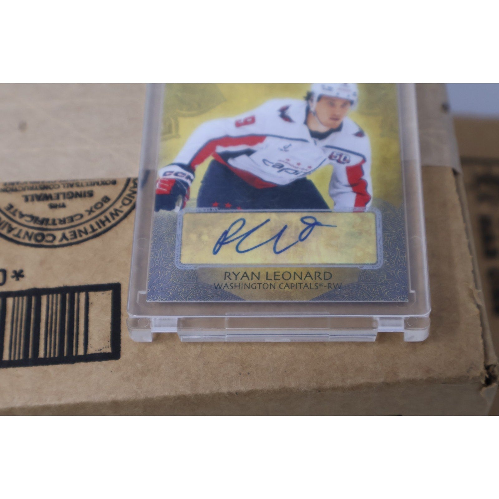 Angled front view of Ryan Leonard Top Tier Rookie Signatures auto card in protective holder