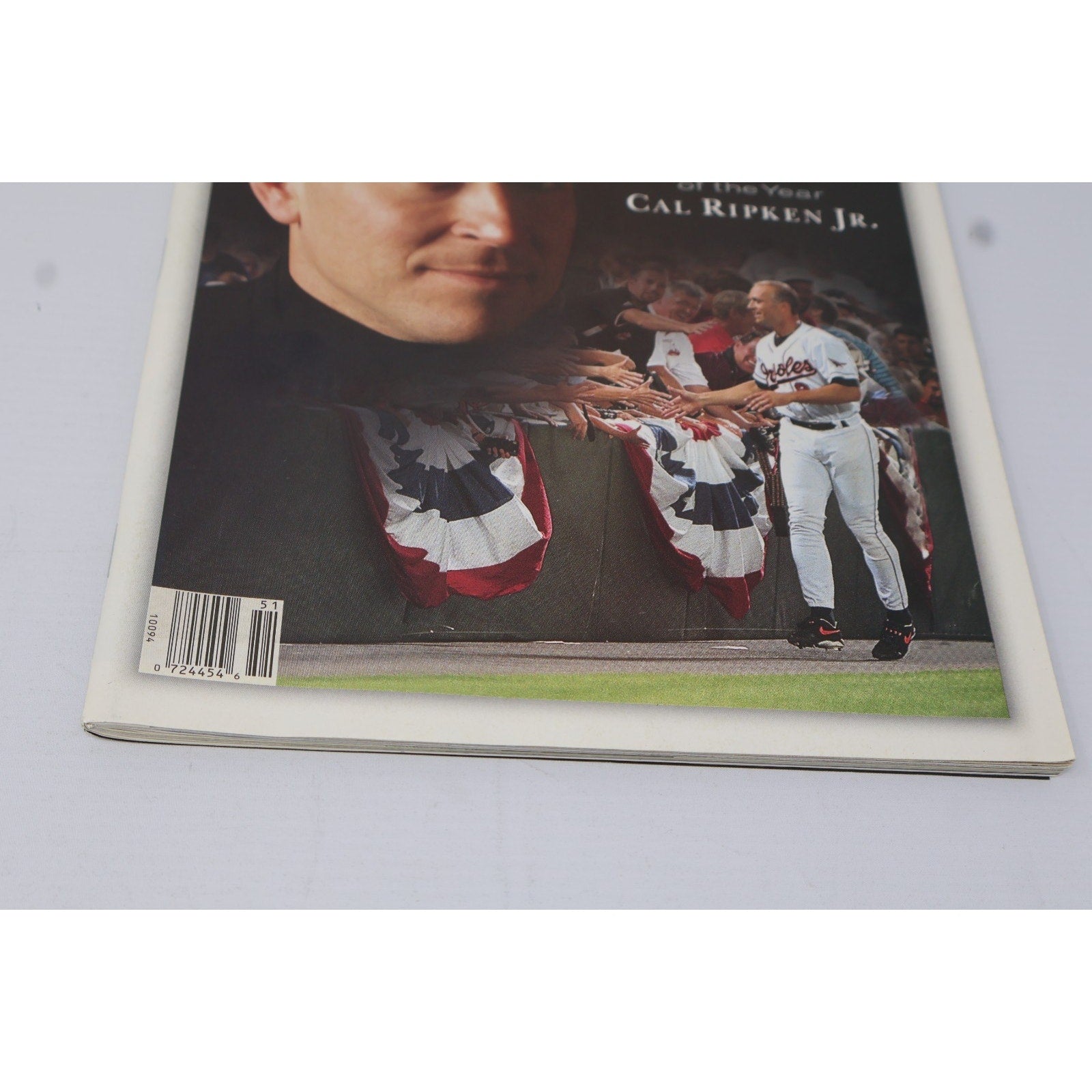 Angled close-up of vintage Cal Ripken Jr Sports Illustrated magazine covers