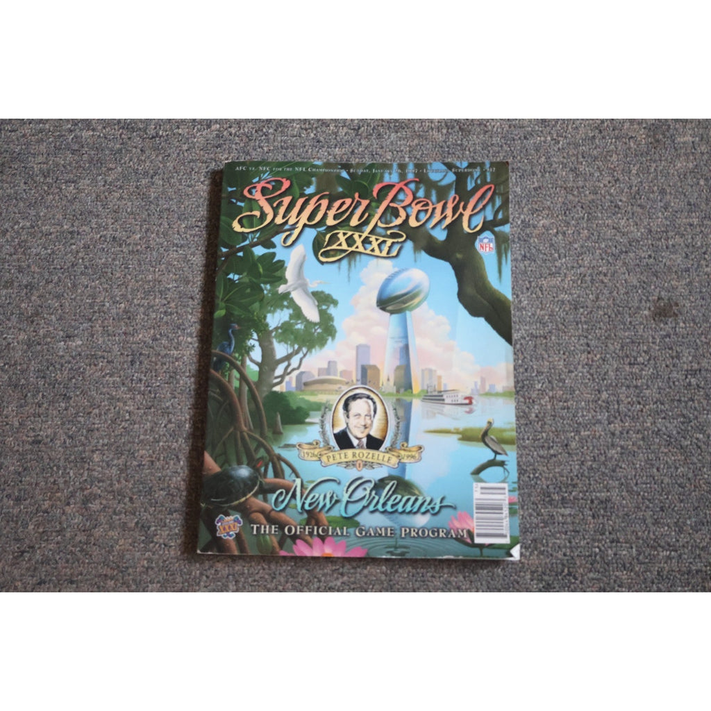 Super Bowl XXXI Official Program from January 26 1997 featuring Packers vs Patriots in New Orleans