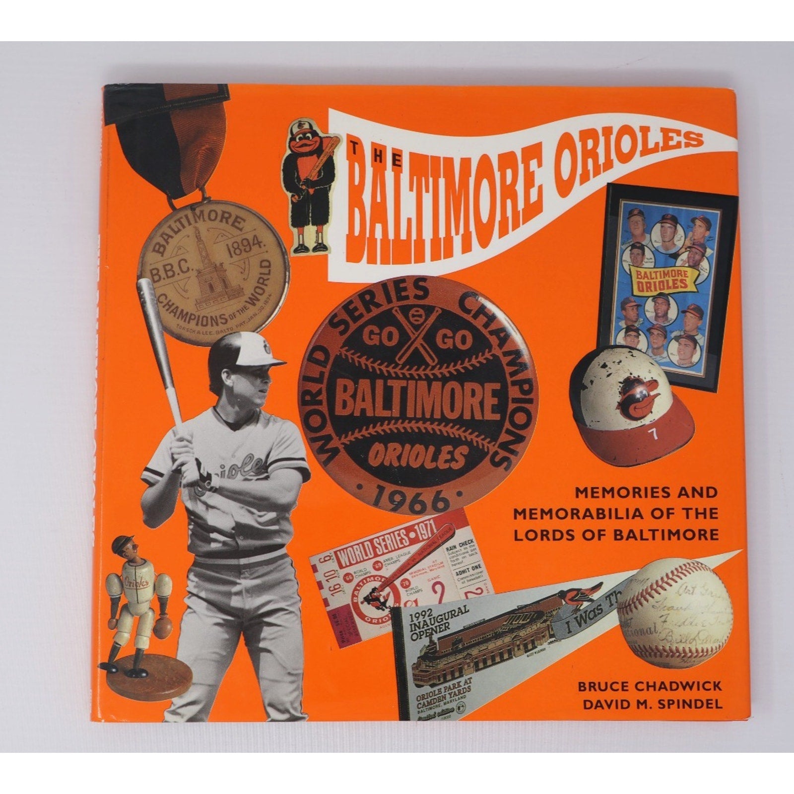 Front cover of “The Baltimore Orioles” by Bruce Chadwick featuring vintage Orioles memorabilia and team history artwork