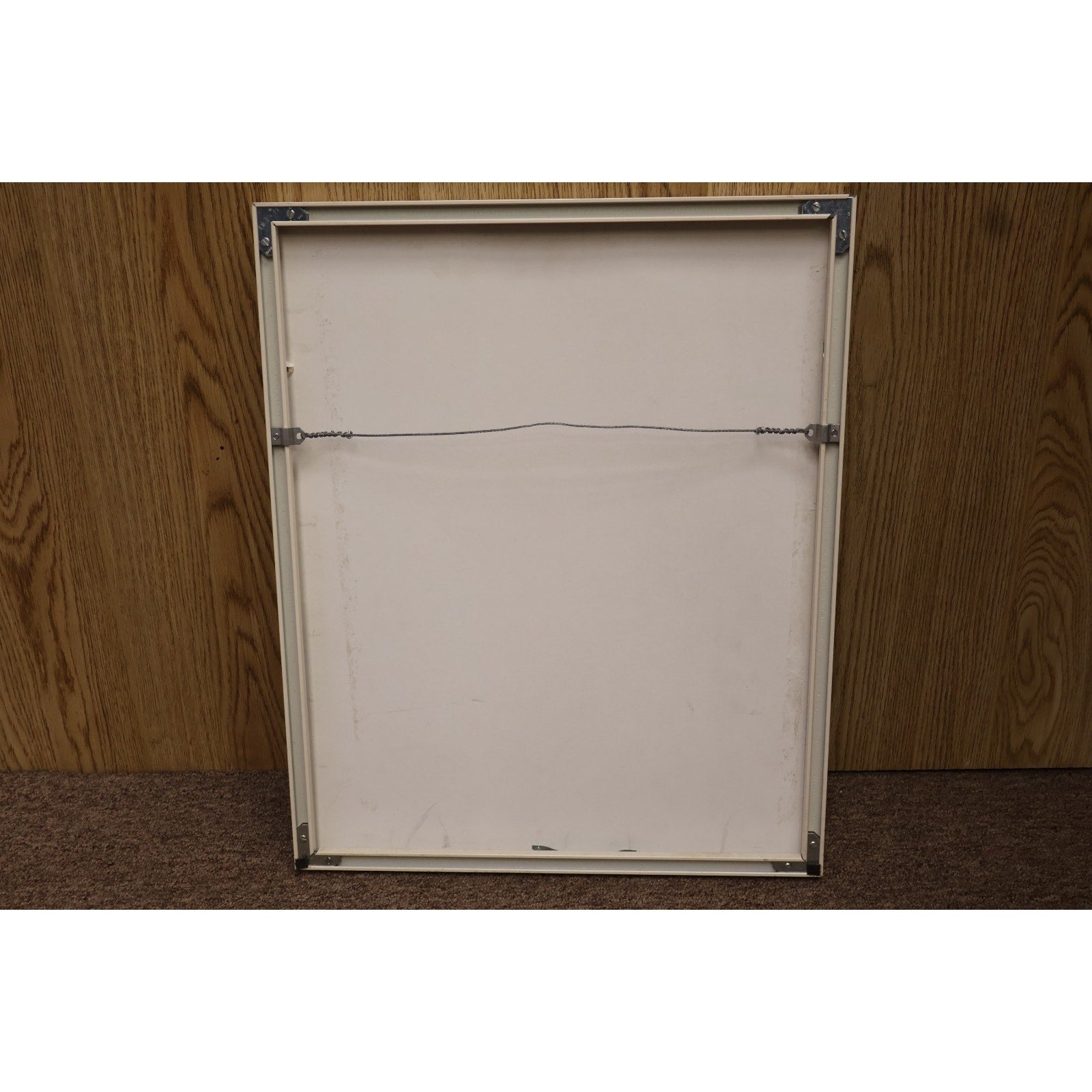 Backside view of framed Baltimore Orioles Hall of Fame cartoon display