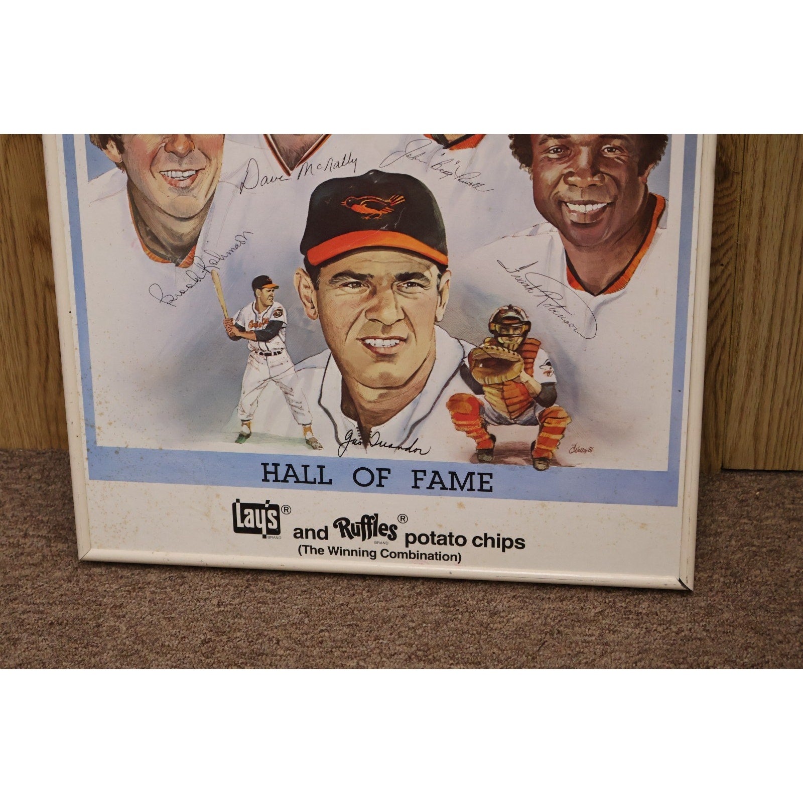 Close-up detail of illustrated Orioles Hall of Fame players and vintage artwork styling