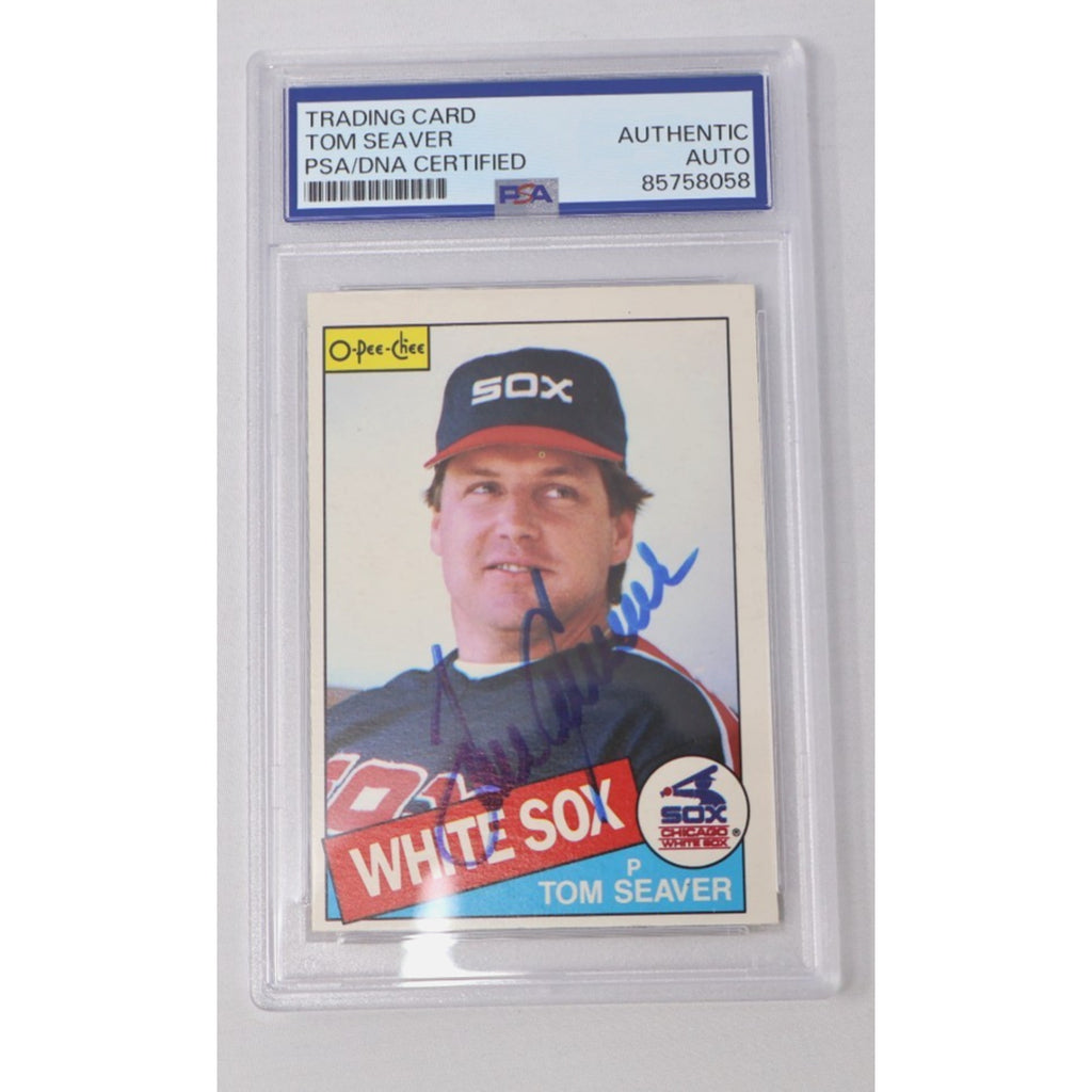 Front view of a 1985 O-Pee-Chee Tom Seaver baseball card featuring a blue ink autograph, PSA/DNA authenticated and slabbed, showing Seaver in his Chicago White Sox uniform