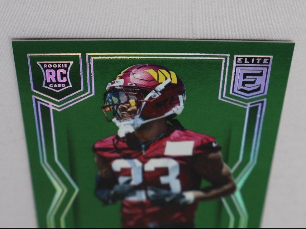 Front display of Trey Amos Elite Status rookie card with green border design
