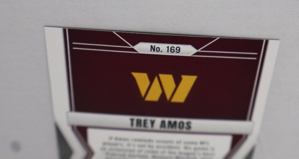 Additional back view showing Commanders branding and Panini card information