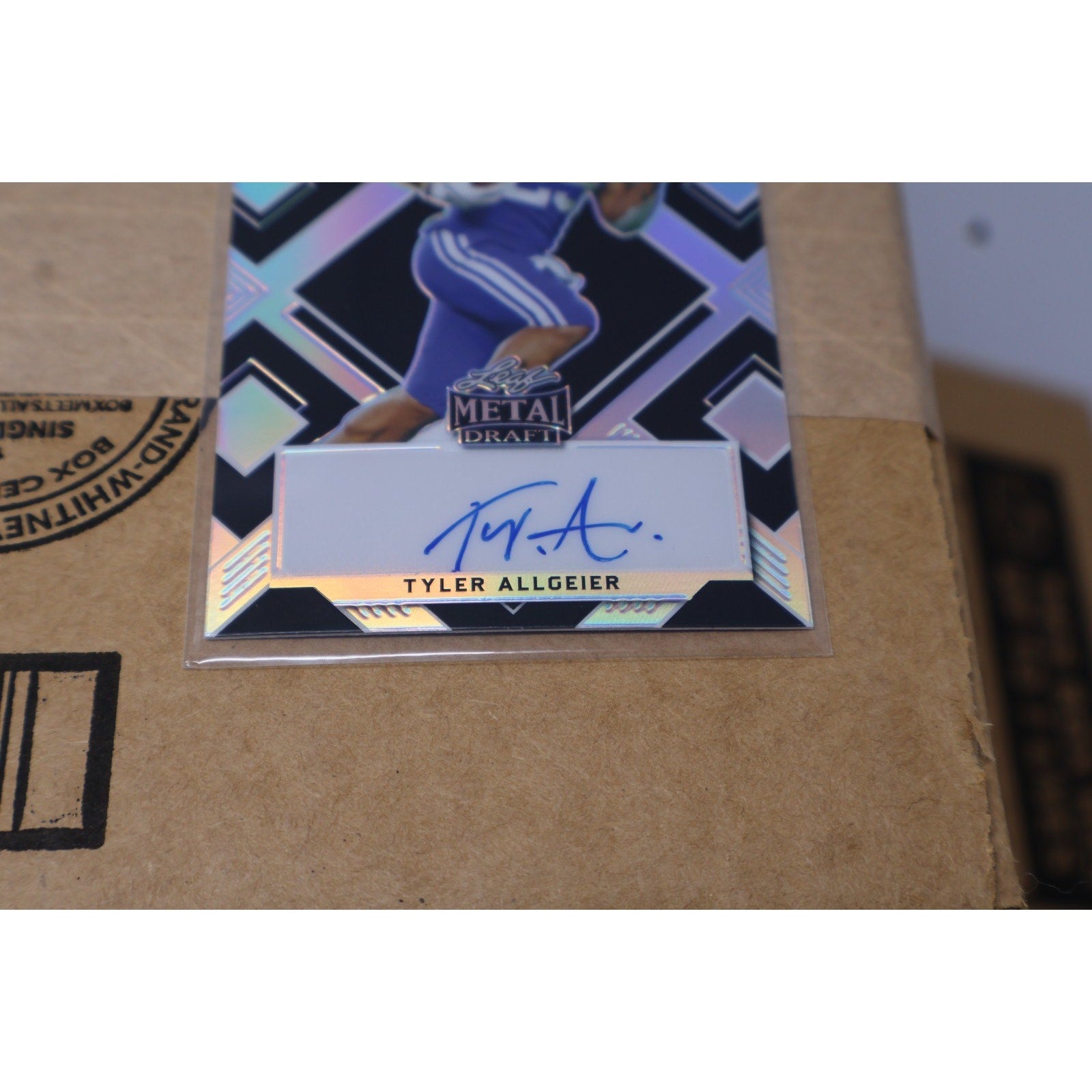 Close-up view of Tyler Allgeier autograph on Leaf Metal Draft card