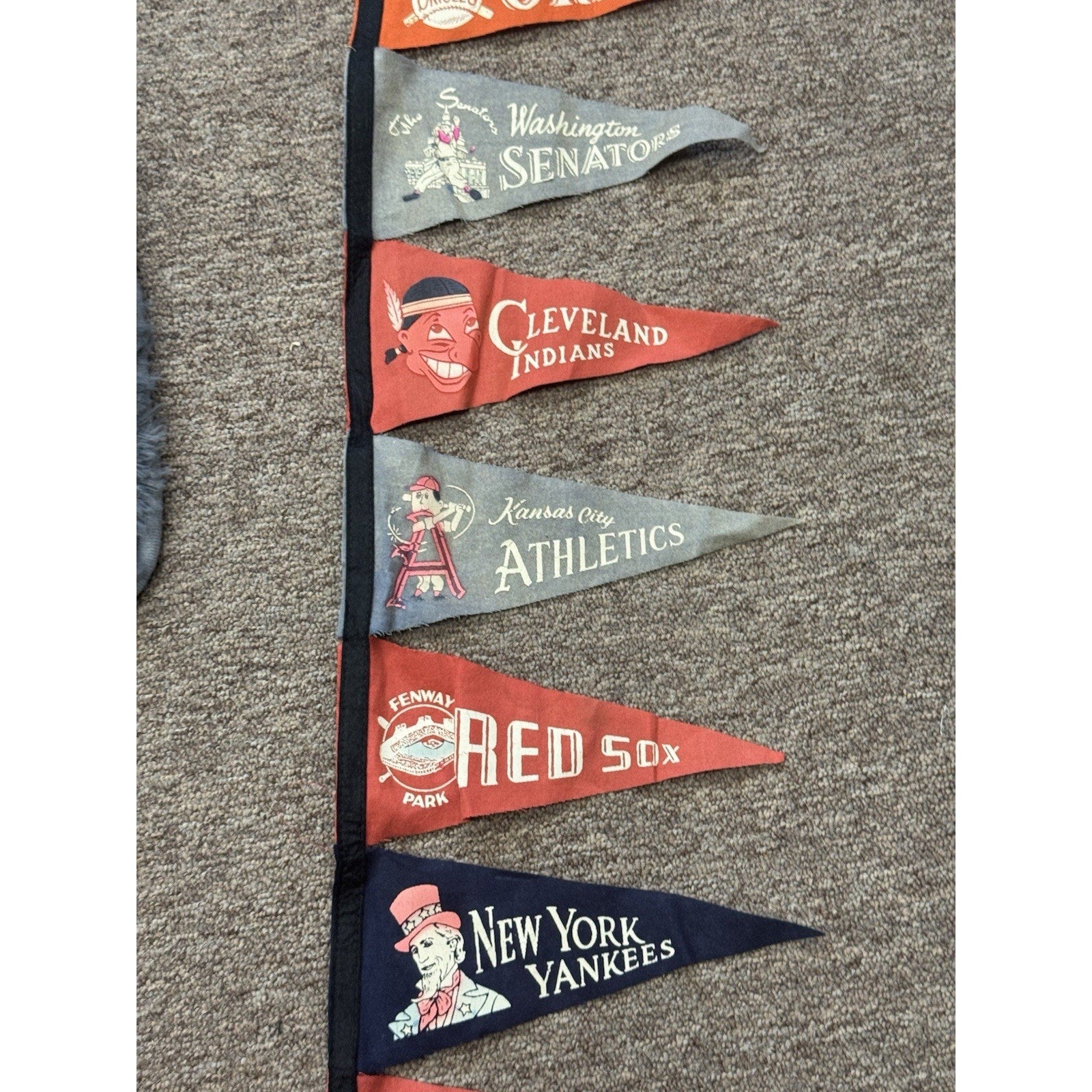 Middle section of retro American League baseball felt pennant collection