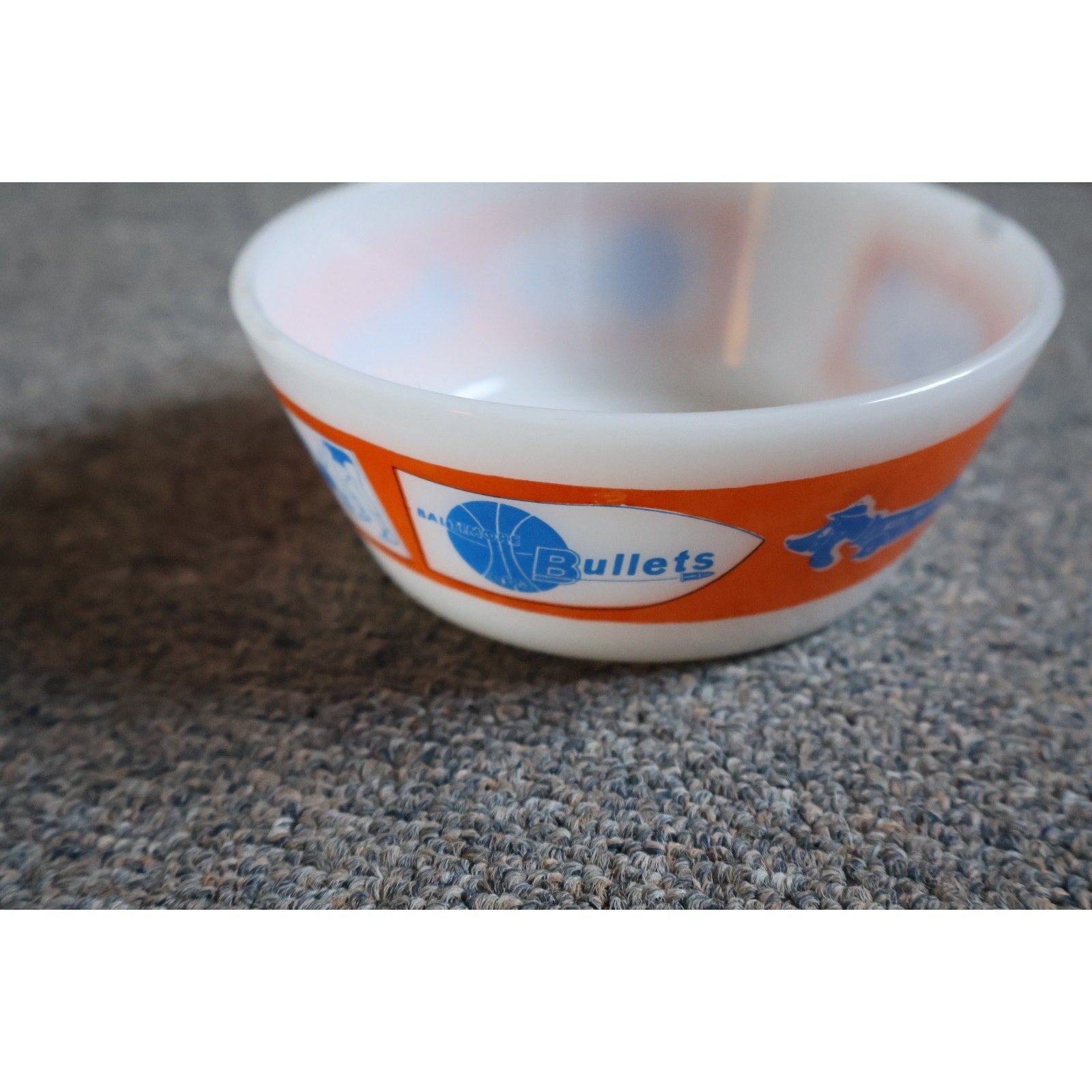 Vintage 1960s Baltimore Bullets white glass bowl featuring Alex The Bullet logo and team graphics