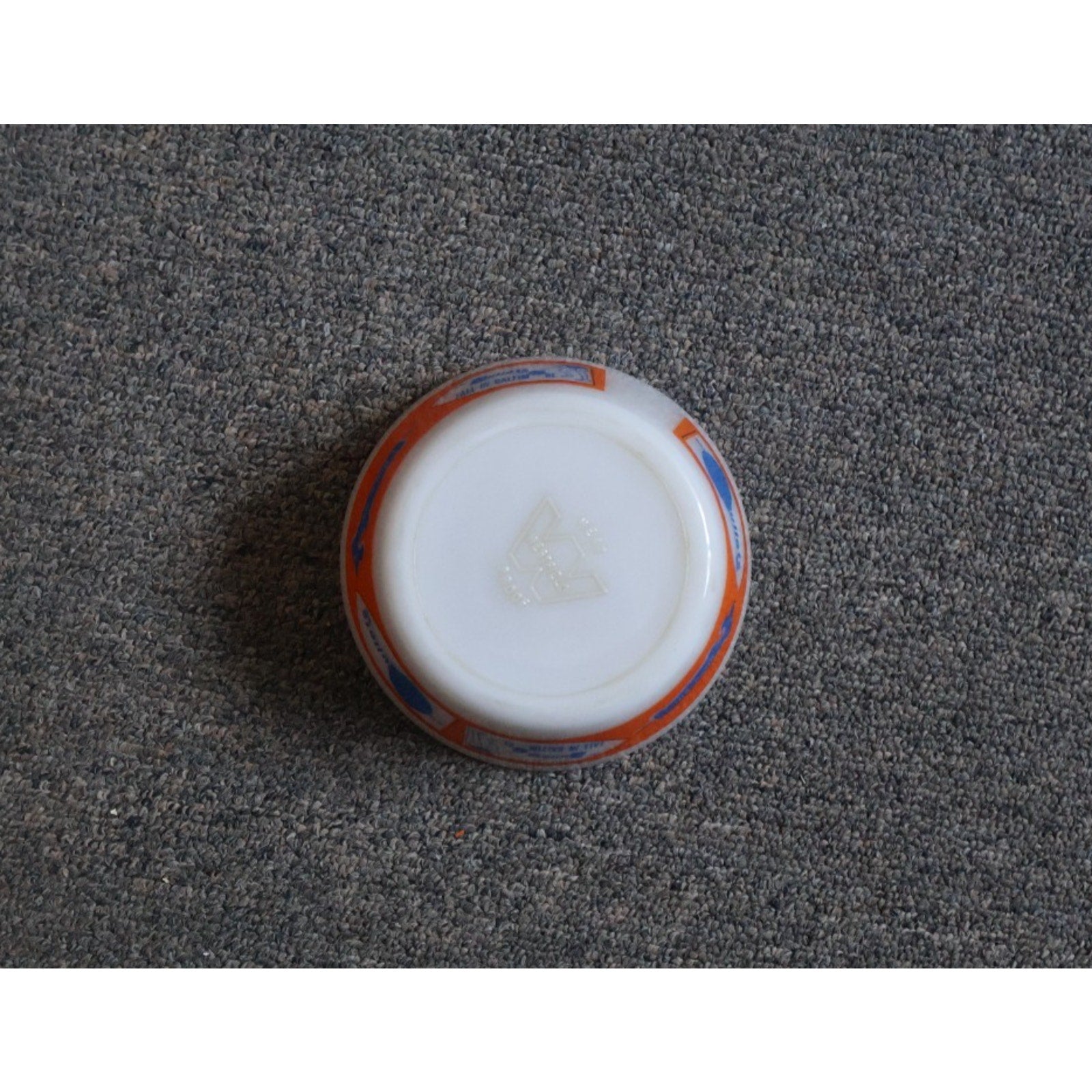 Bottom view of vintage Baltimore Bullets collectible white glass bowl
