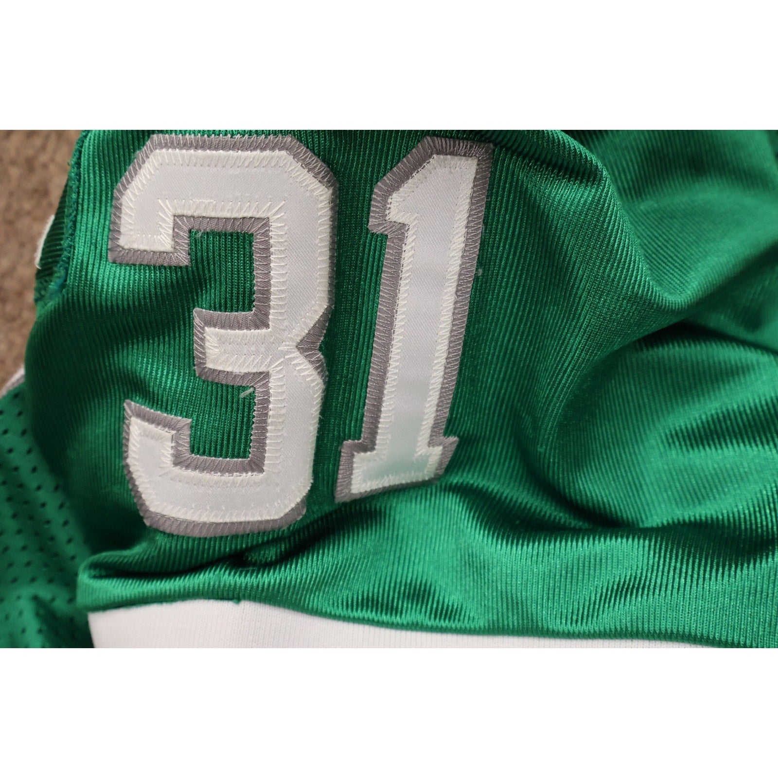 Close-up of number 31 stitching on vintage Philadelphia Eagles jersey