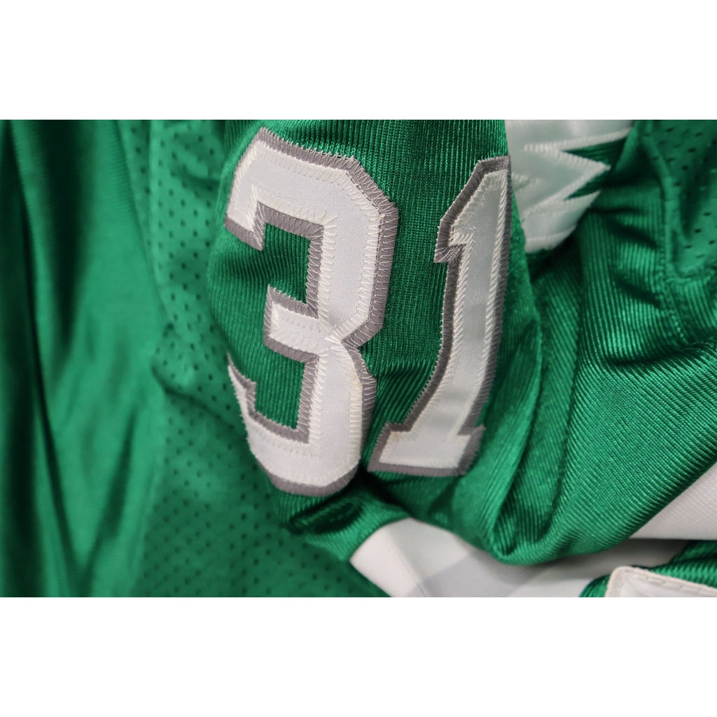 Interior tag and commemorative patch detail on Mitchell and Ness Eagles jersey