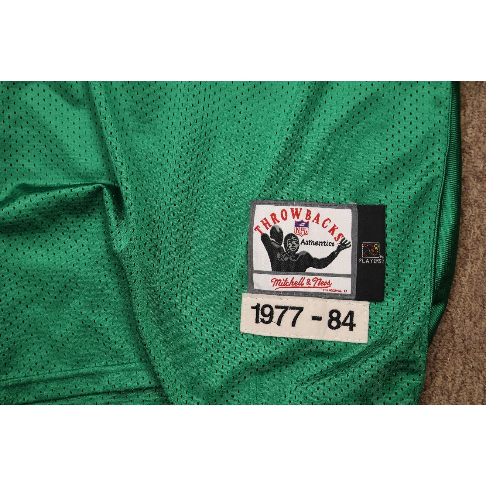 Front lower section of Wilbert Montgomery Eagles throwback jersey