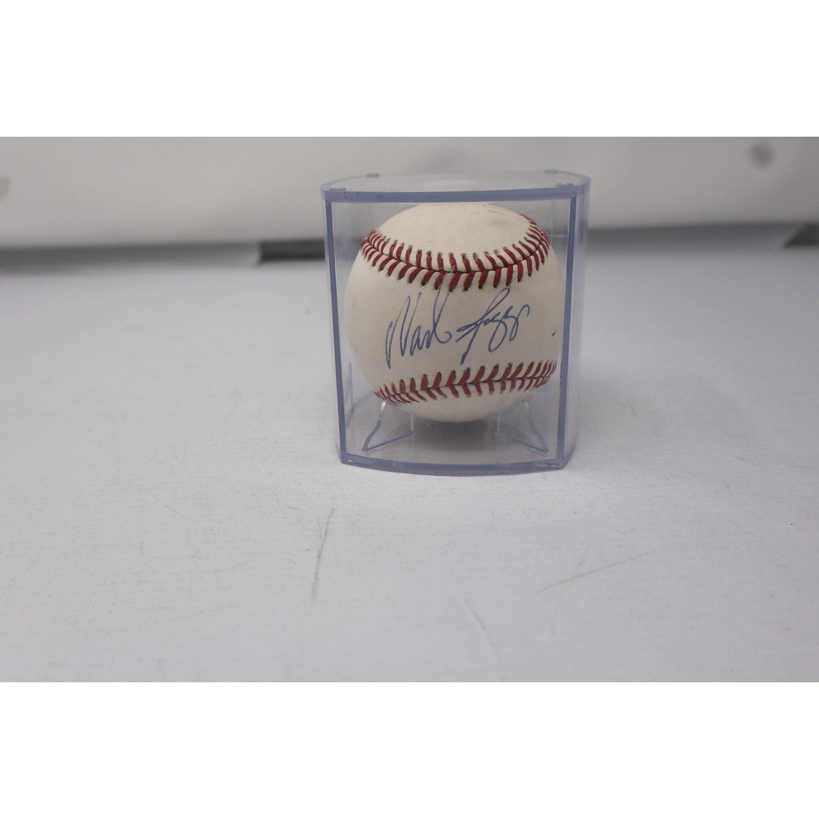 Wade Boggs signed Rawlings baseball displayed in protective cube front view