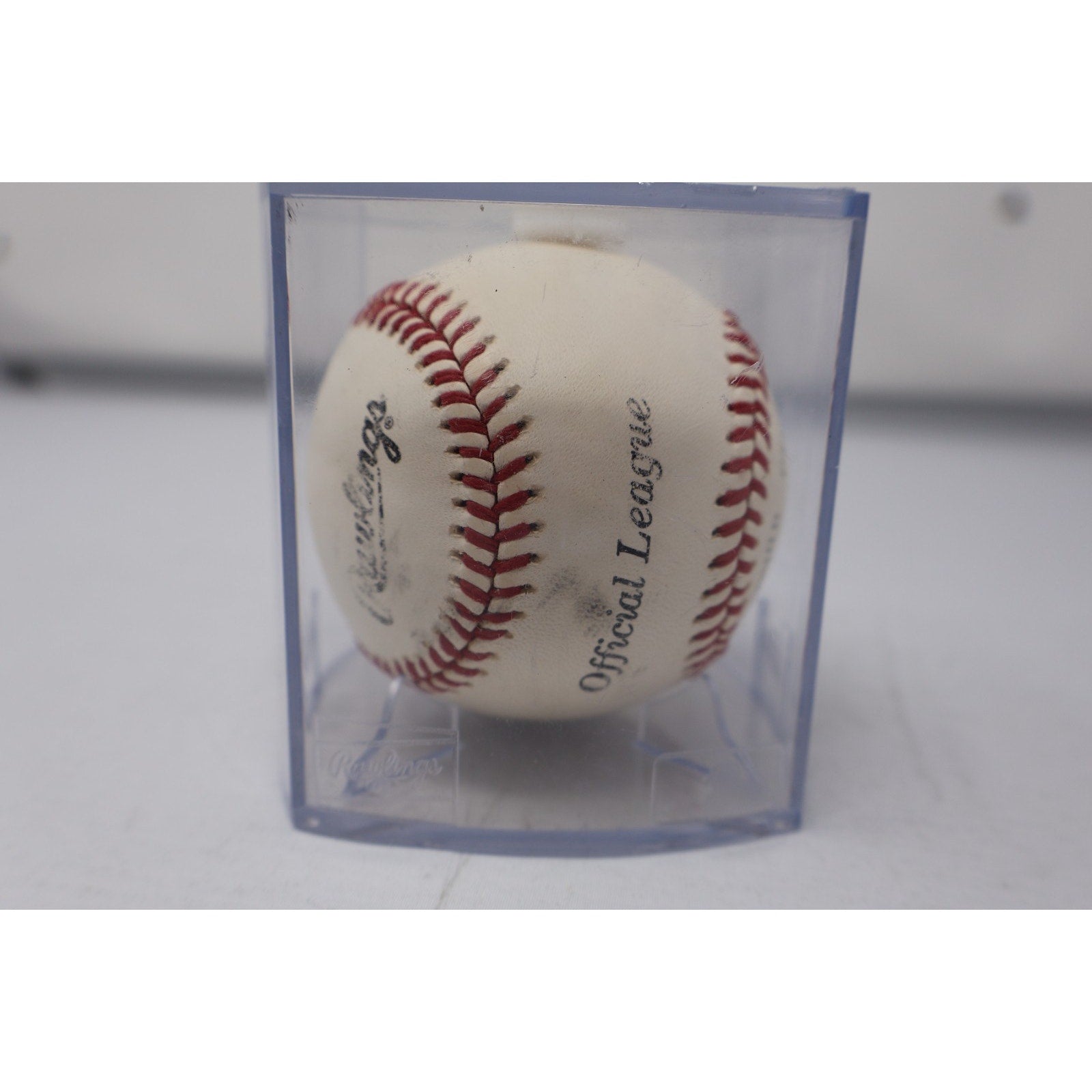 Rear angled close-up of Rawlings baseball and autograph display case