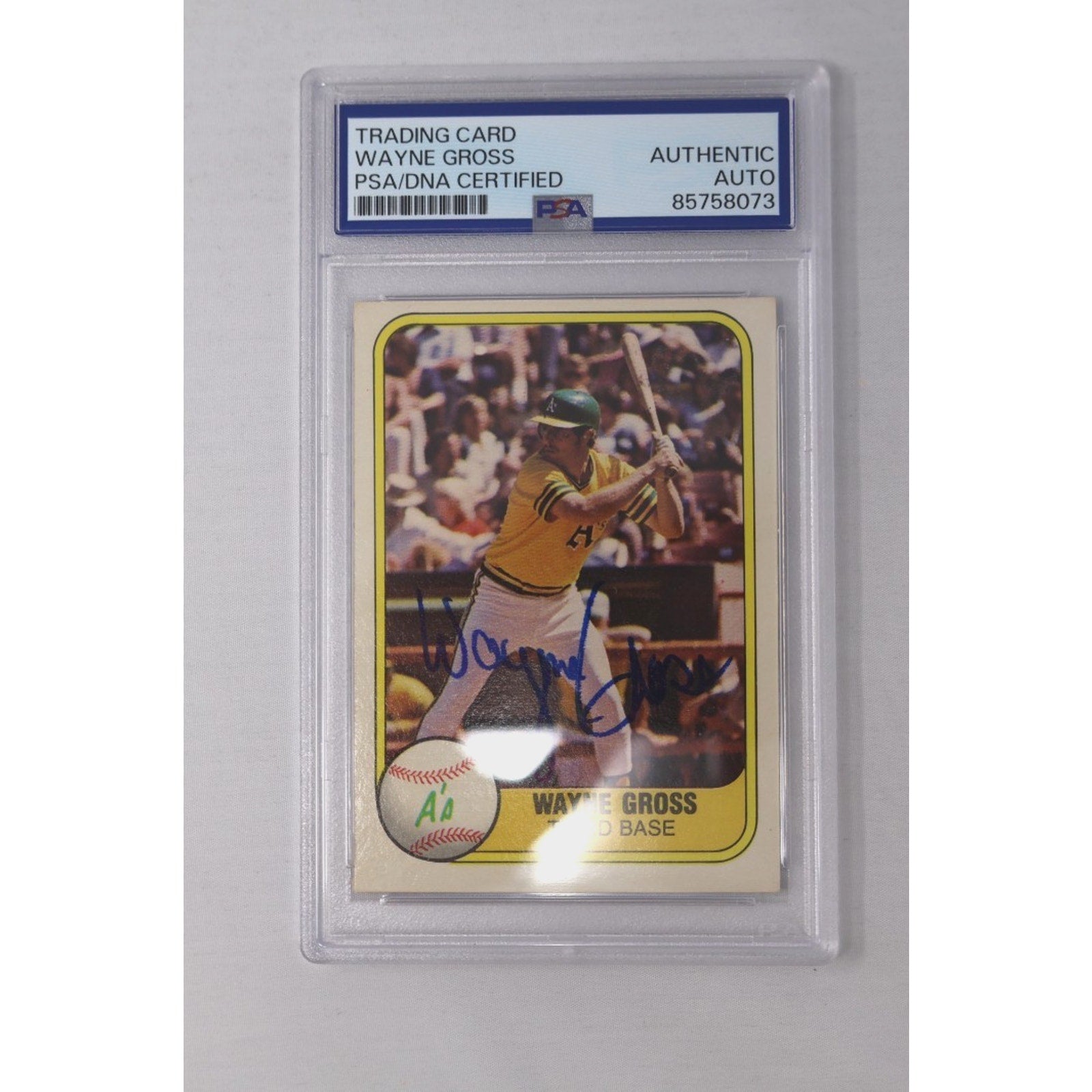 Front view of a 1981 Fleer Wayne Gross baseball card featuring a blue ink autograph, PSA/DNA authenticated and slabbed, showing Gross batting for the Oakland Athletics