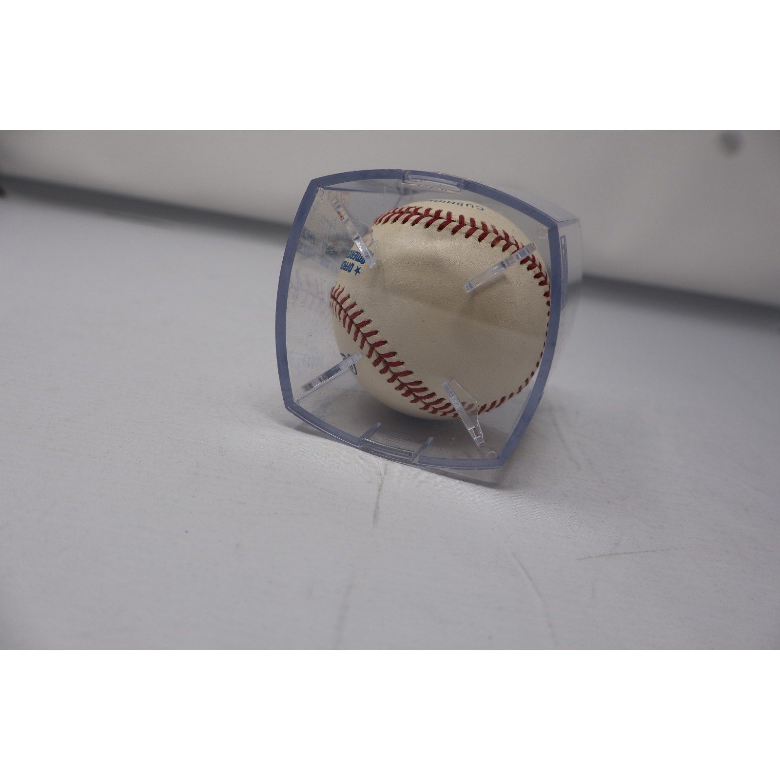 Angled view of Whitey Ford signed Yankees baseball collectible