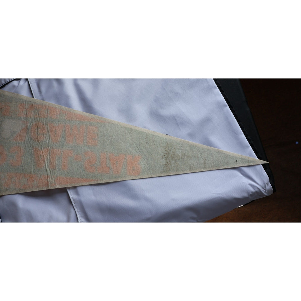Back view of felt pennant showing stitching and material detail